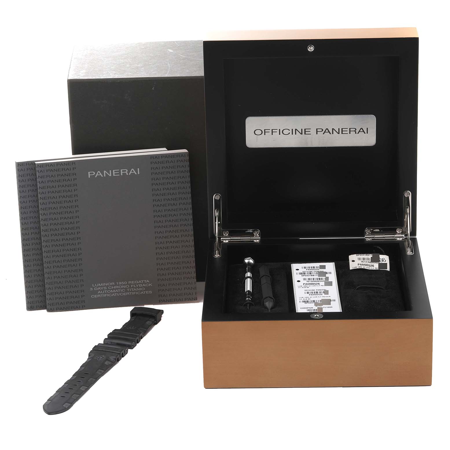 This image shows the packaging, additional strap, tools, and documentation for a Panerai Luminor PAM00526 Men's Titanium Black Dial PAM00526 Men's Titanium Black Dial watch model.