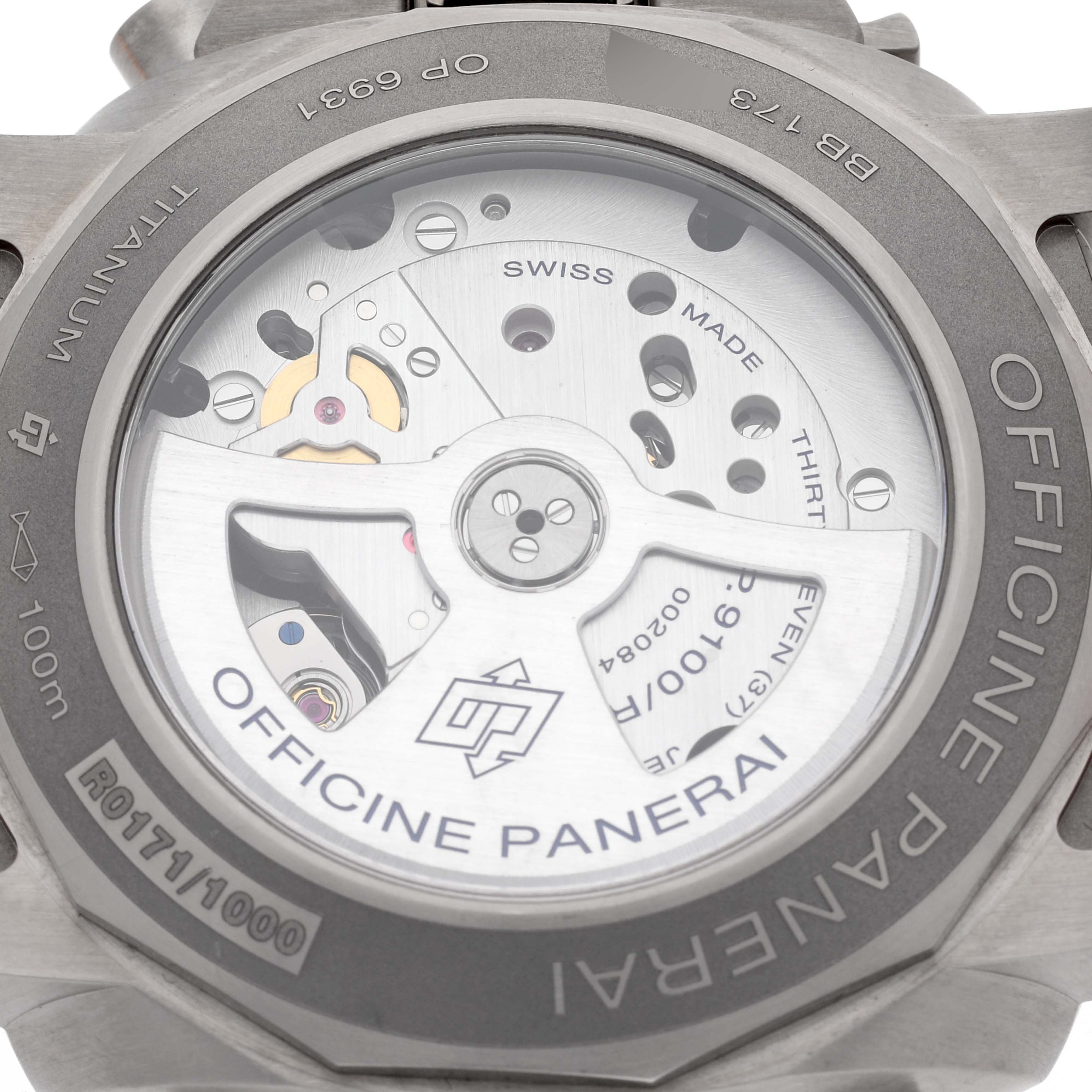 The image shows the back case of a Panerai Luminor PAM00526 Men's Titanium Black Dial PAM00526 Men's Titanium Black Dial watch, showcasing its inner mechanical movement and inscriptions.