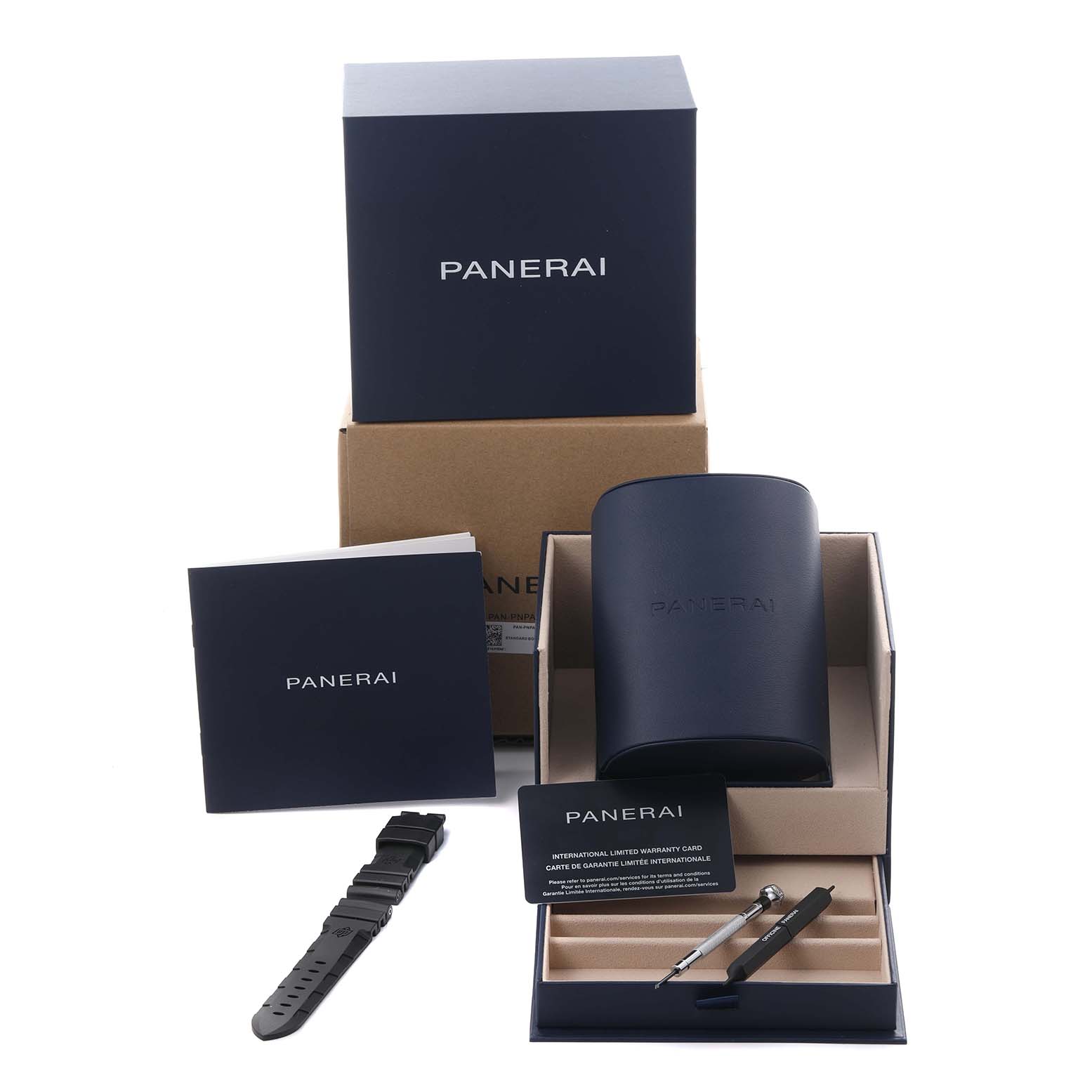 The image shows the Panerai Luminor PAM01579 Men
s Stainless Steel White Dial PAM01579 Men
s Stainless Steel White Dial watch packaging, with a strap, tools, warranty card, and instruction booklet.