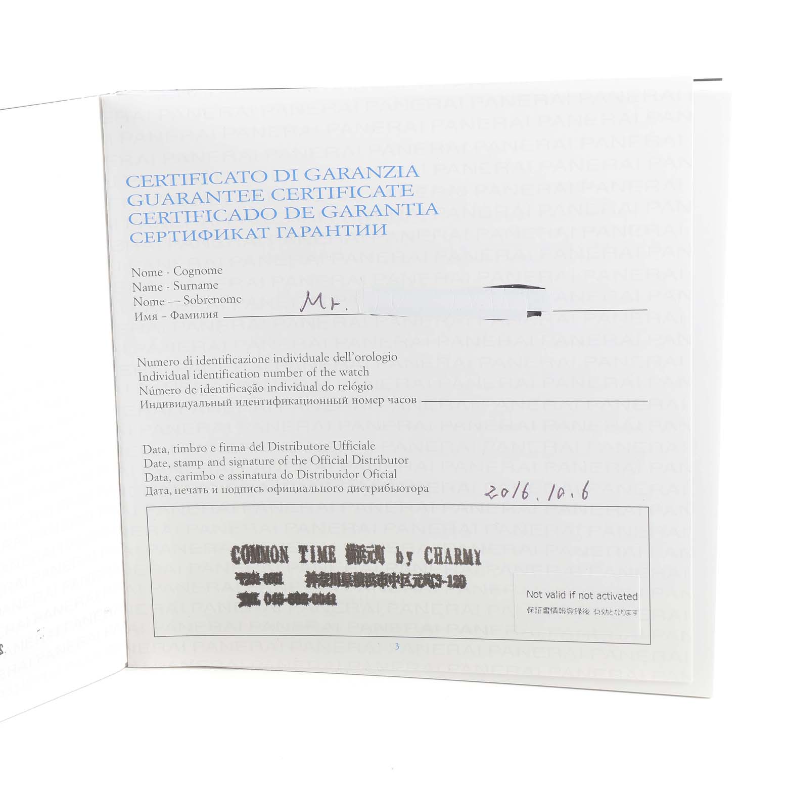 This image shows a warranty certificate for the Luminor model by Panerai from an angle displaying the open document.