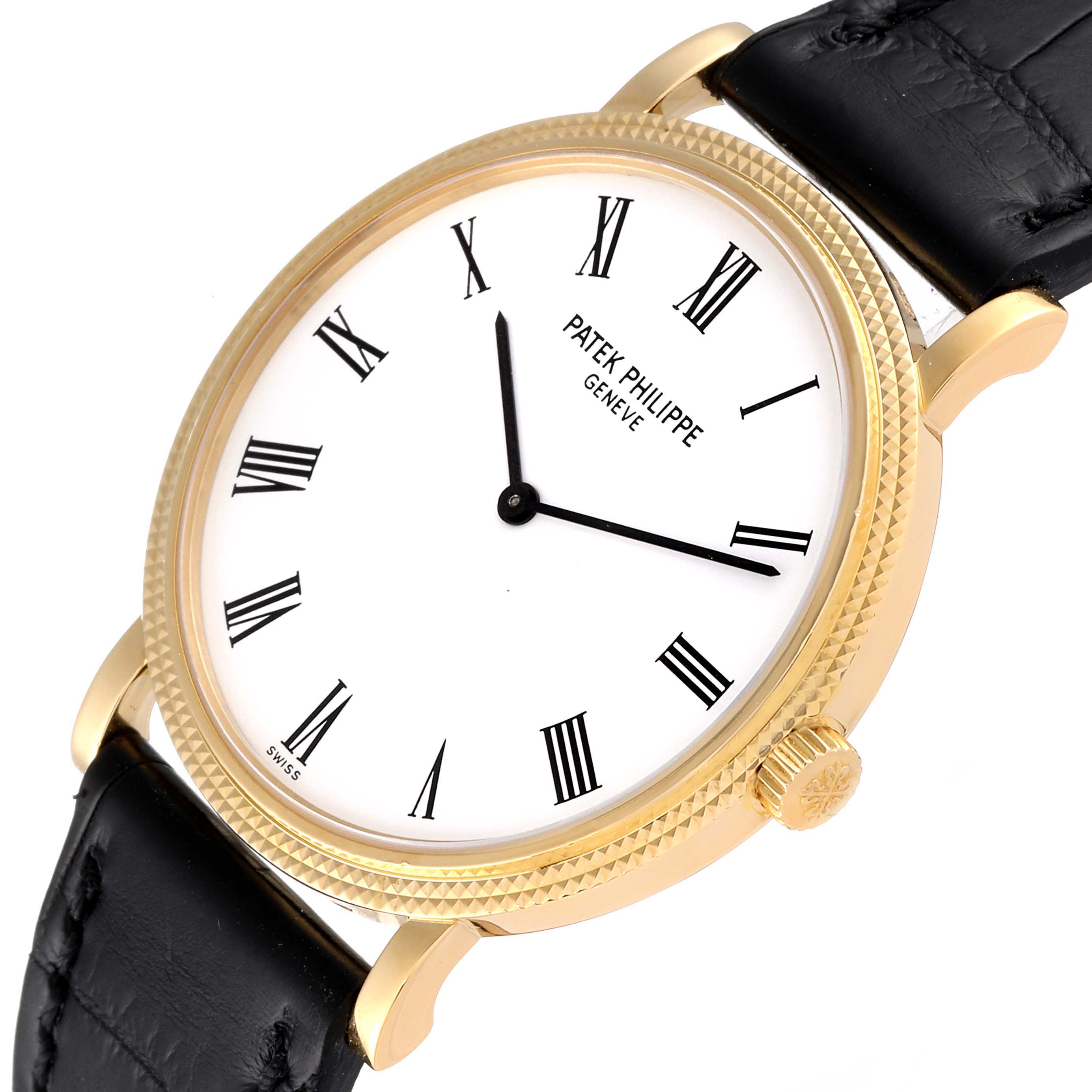 The image shows a front-angle view of a Patek Philippe Calatrava 5120J Men's Yellow Gold White Dial 5120J Men's Yellow Gold White Dial watch face, including its bezel, crown, and black leather strap.