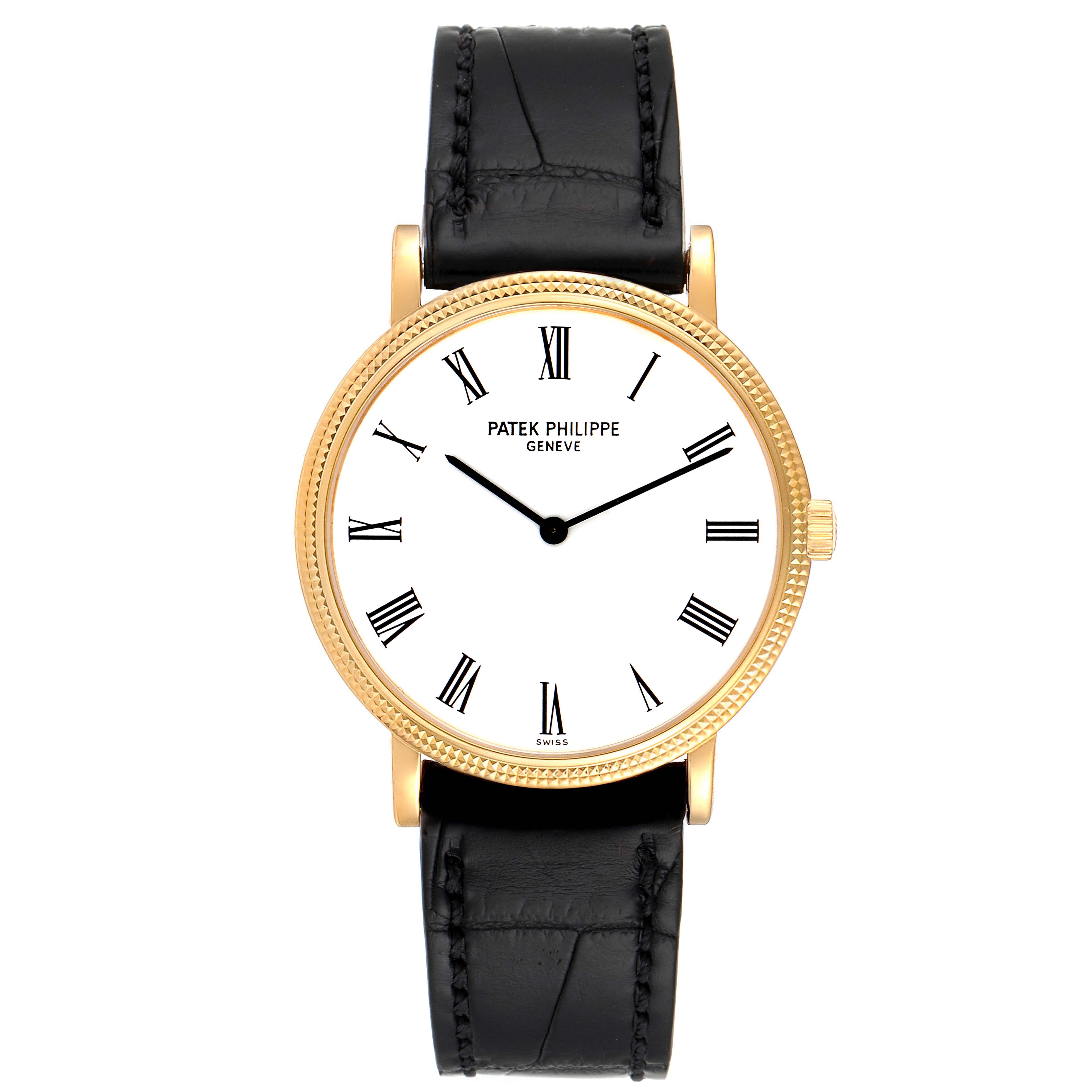 This image shows a front view of a Patek Philippe Calatrava 5120J Men's Yellow Gold White Dial 5120J Men's Yellow Gold White Dial with a black leather strap, white dial, and gold casing.