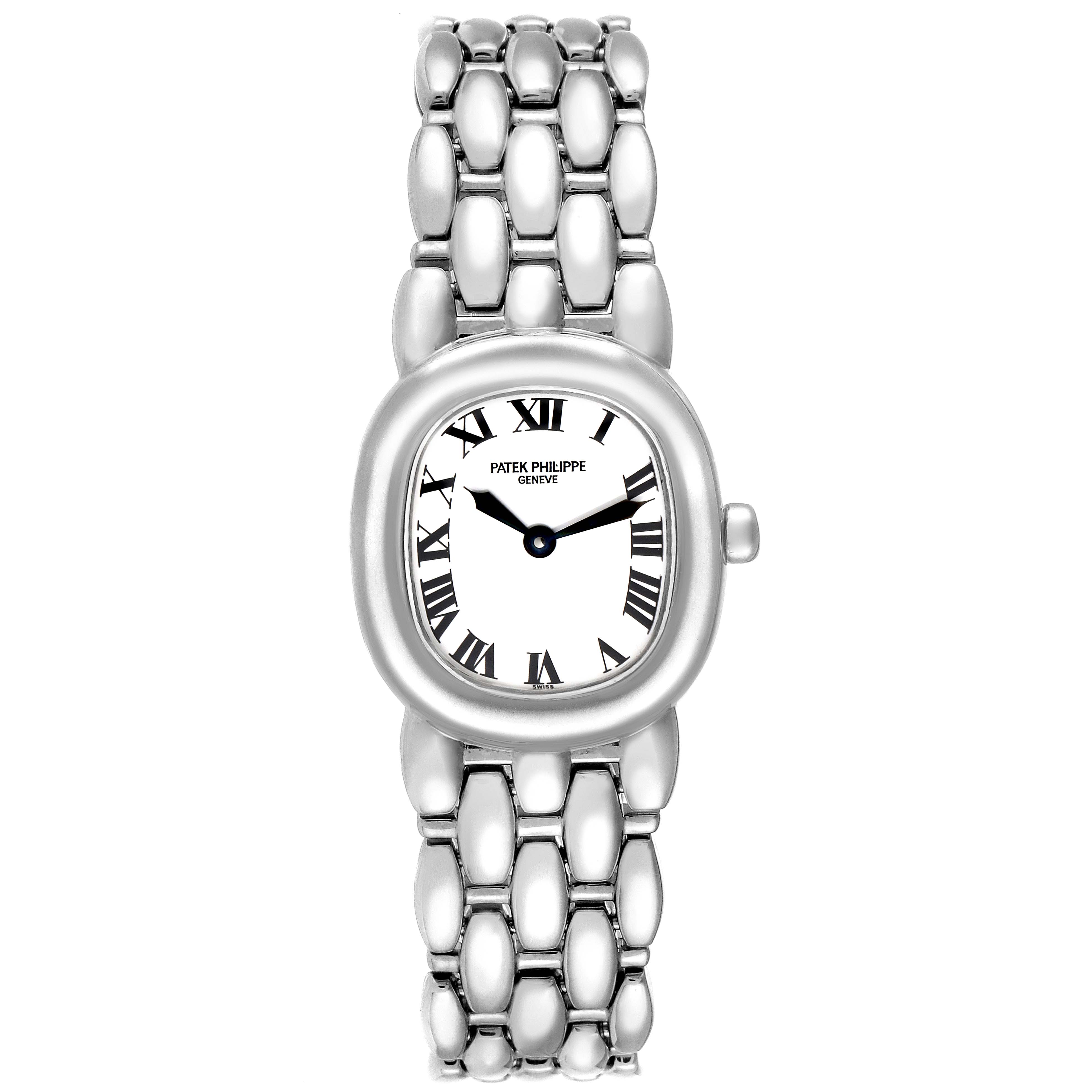 The image shows a Patek Philippe Golden Ellipse 4830G Women's White Gold White Dial 4830G Women's White Gold White Dial watch with a silver bracelet, viewed from a top angle.