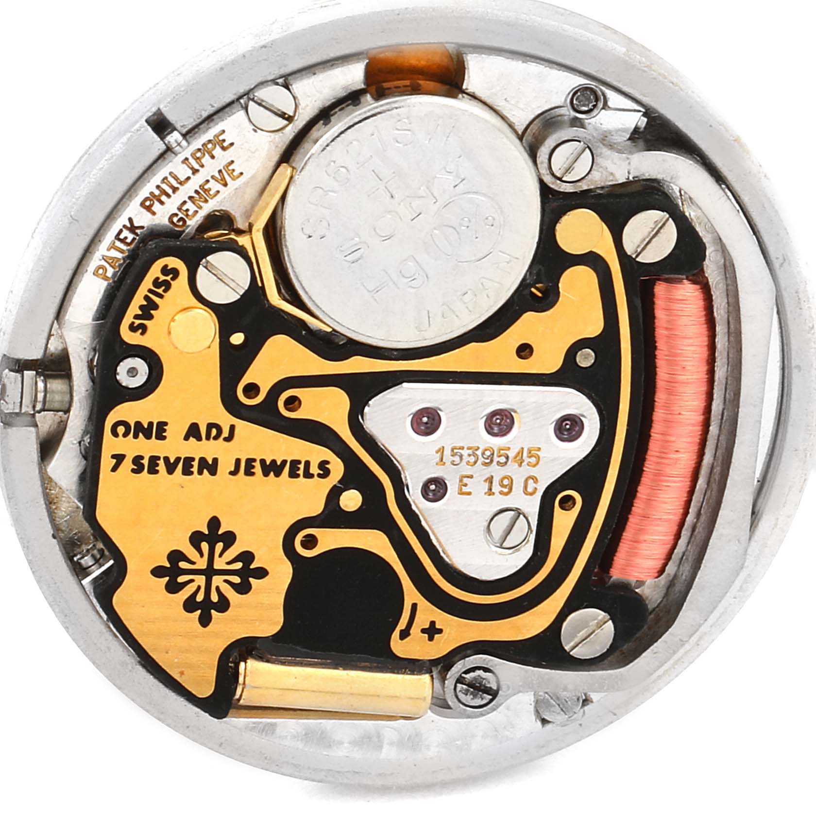 This image shows the internal movement and components of a Patek Philippe Nautilus 4700/530 Women's Yellow Gold Beige Dial 4700/530 Women's Yellow Gold Beige Dial watch.