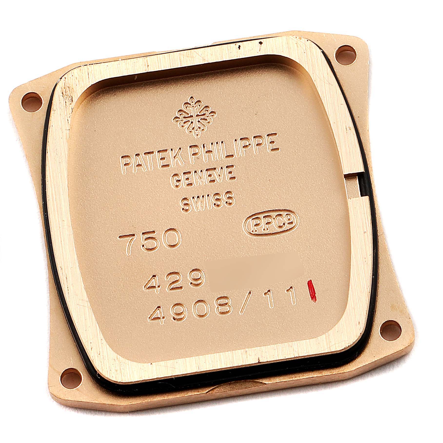 The image shows the back plate of a Patek Philippe Twenty-4 4908R Women's Rose Gold Silver Dial 4908R Women's Rose Gold Silver Dial watch, displaying model and brand engravings.
