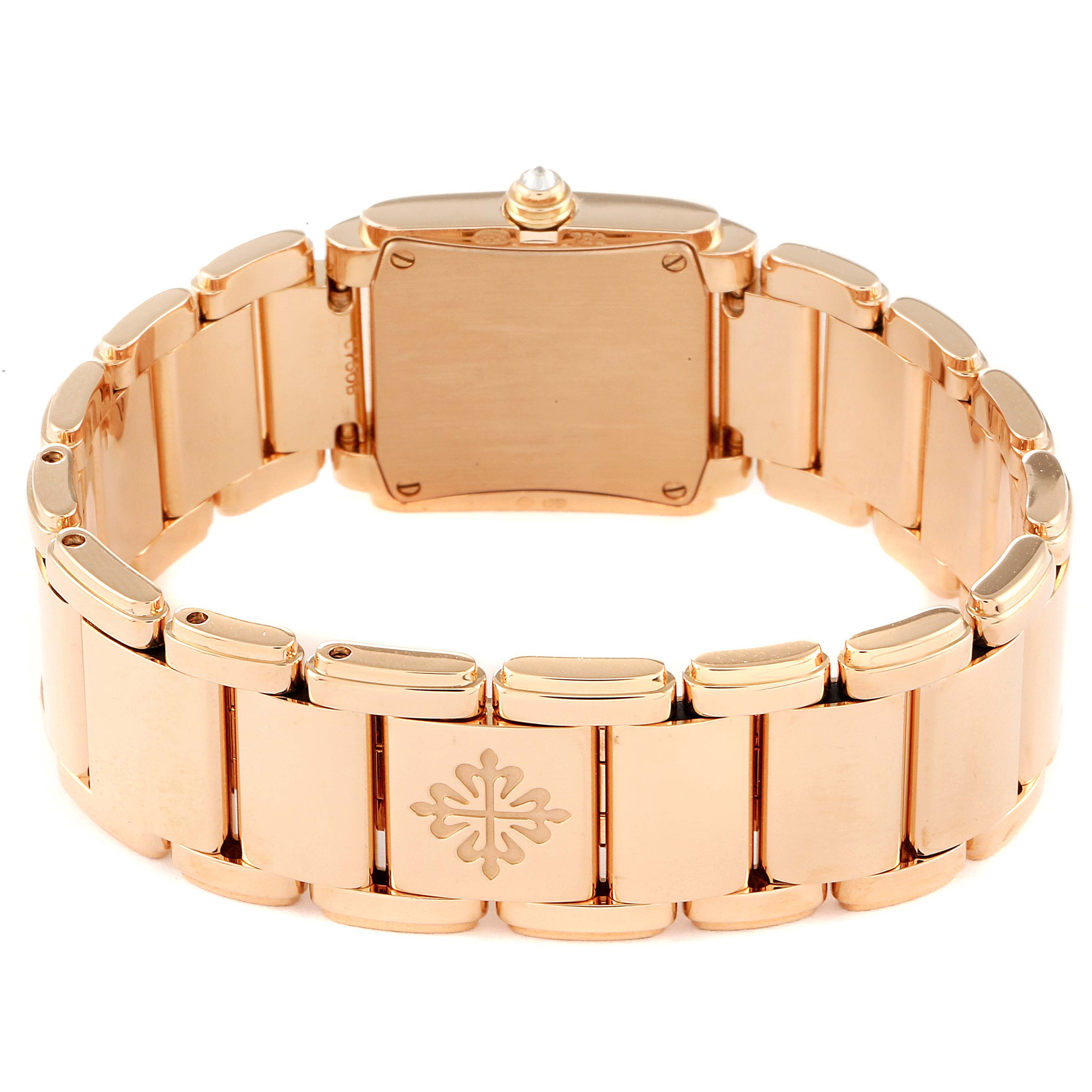 This image shows the back angle of a Patek Philippe Twenty-4 4908R Women's Rose Gold Silver Dial 4908R Women's Rose Gold Silver Dial model watch, focusing on the bracelet and the rectangular case back.