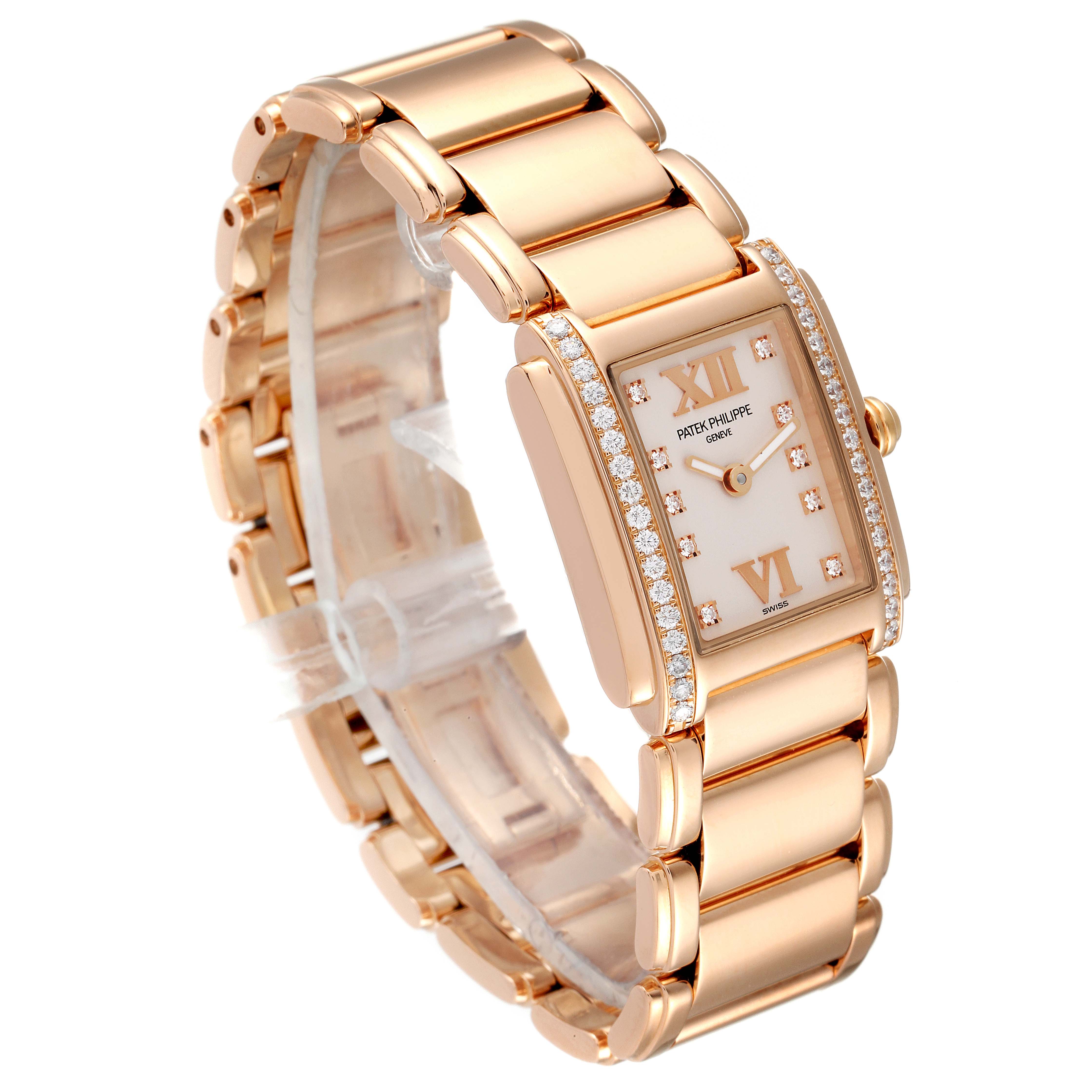 The image shows a Patek Philippe Twenty-4 4908R Women's Rose Gold Silver Dial 4908R Women's Rose Gold Silver Dial watch from a three-quarter angle, highlighting its gold bracelet, case, and diamond-studded bezel.