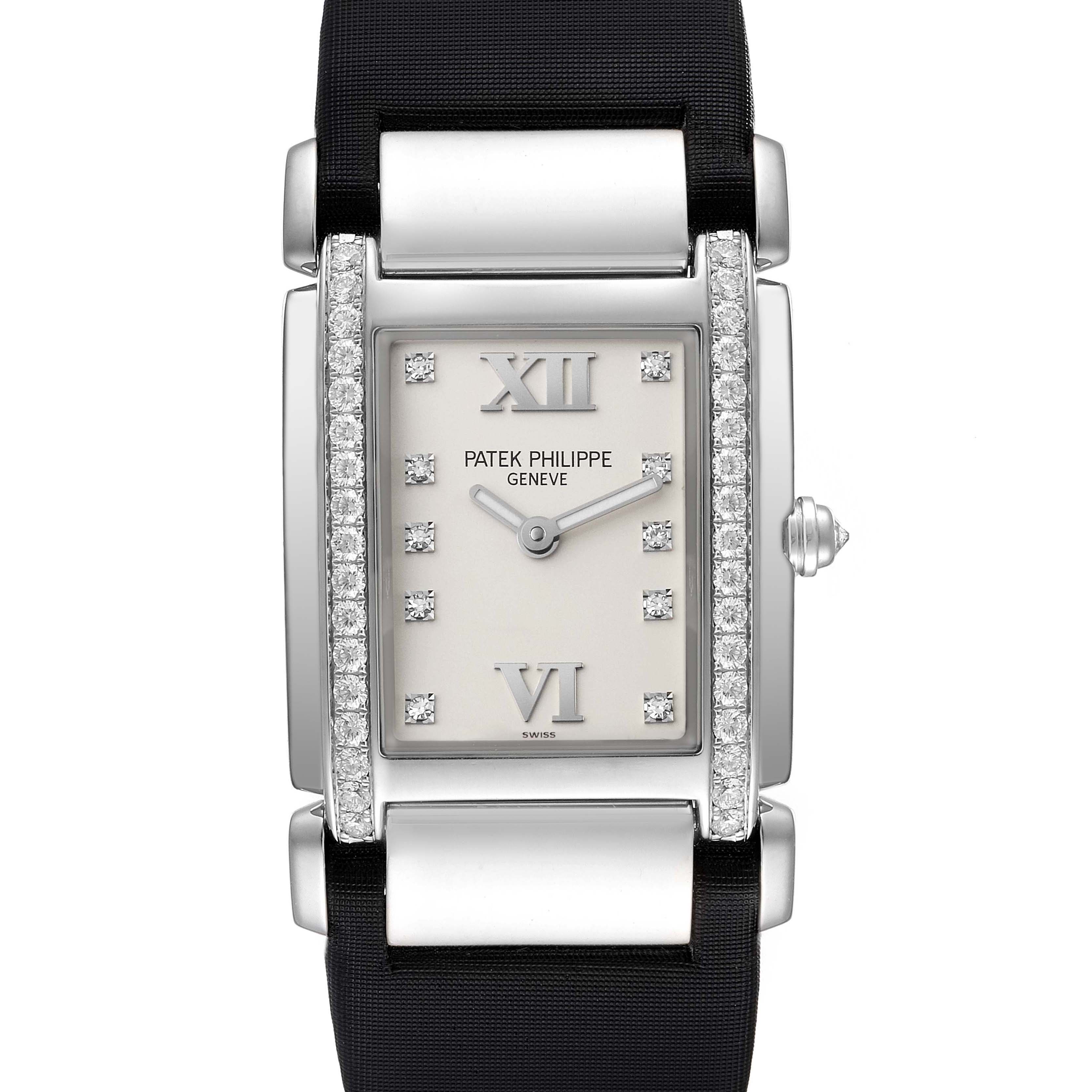 The image shows a front view of the Patek Philippe Twenty-4 4920G-010 Women's White Gold Silver Dial 4920G-010 Women's White Gold Silver Dial watch with its rectangular dial and diamond-set bezel.