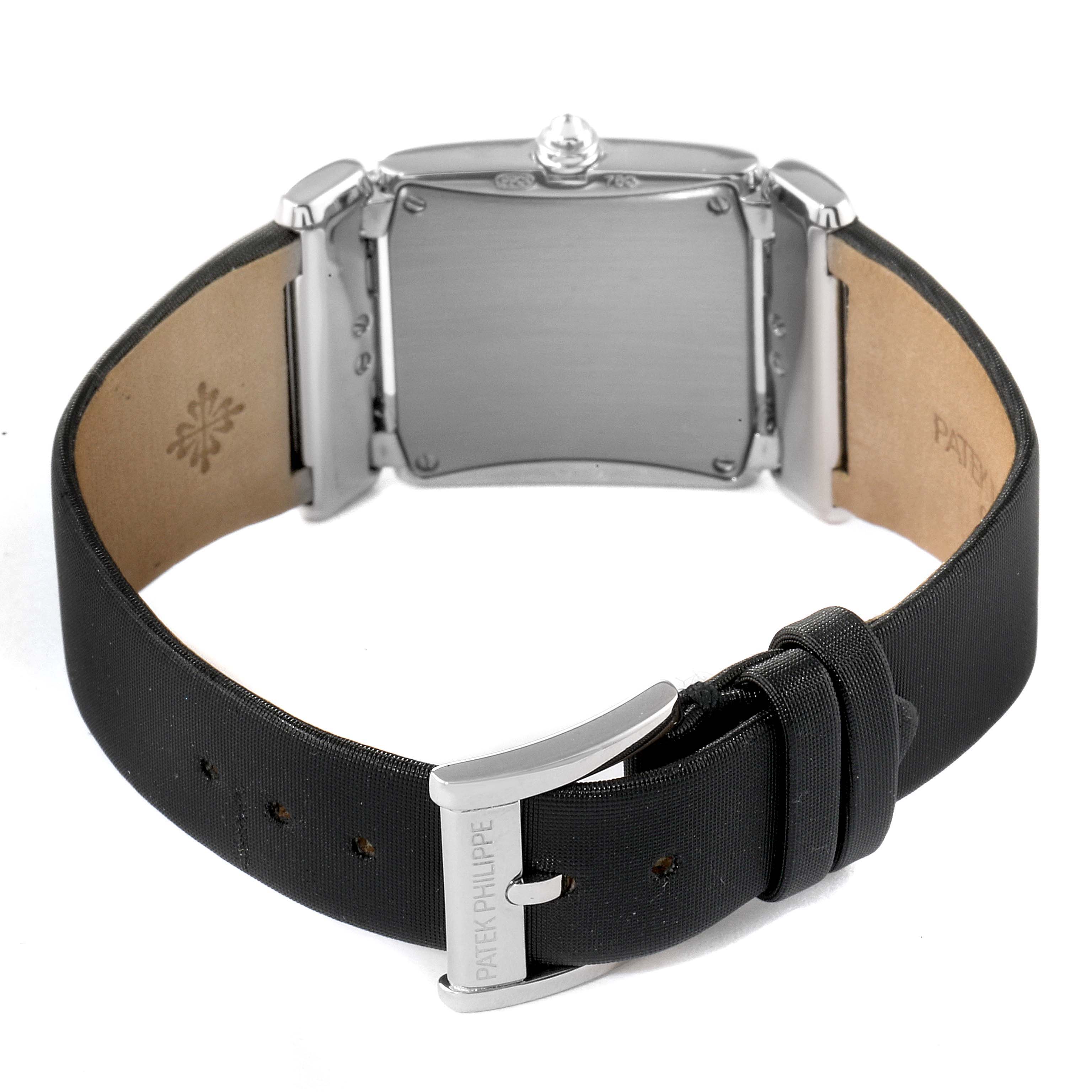 The image shows the back and strap of a Twenty-4 model by Patek Philippe, including the buckle and clasp engraved with the brand's name.