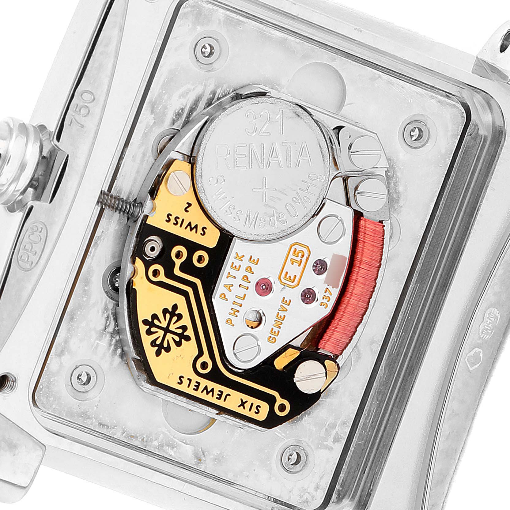 This close-up image shows the movement and battery compartment of a Patek Philippe Twenty-4 4920G-010 Women's White Gold Silver Dial 4920G-010 Women's White Gold Silver Dial watch.