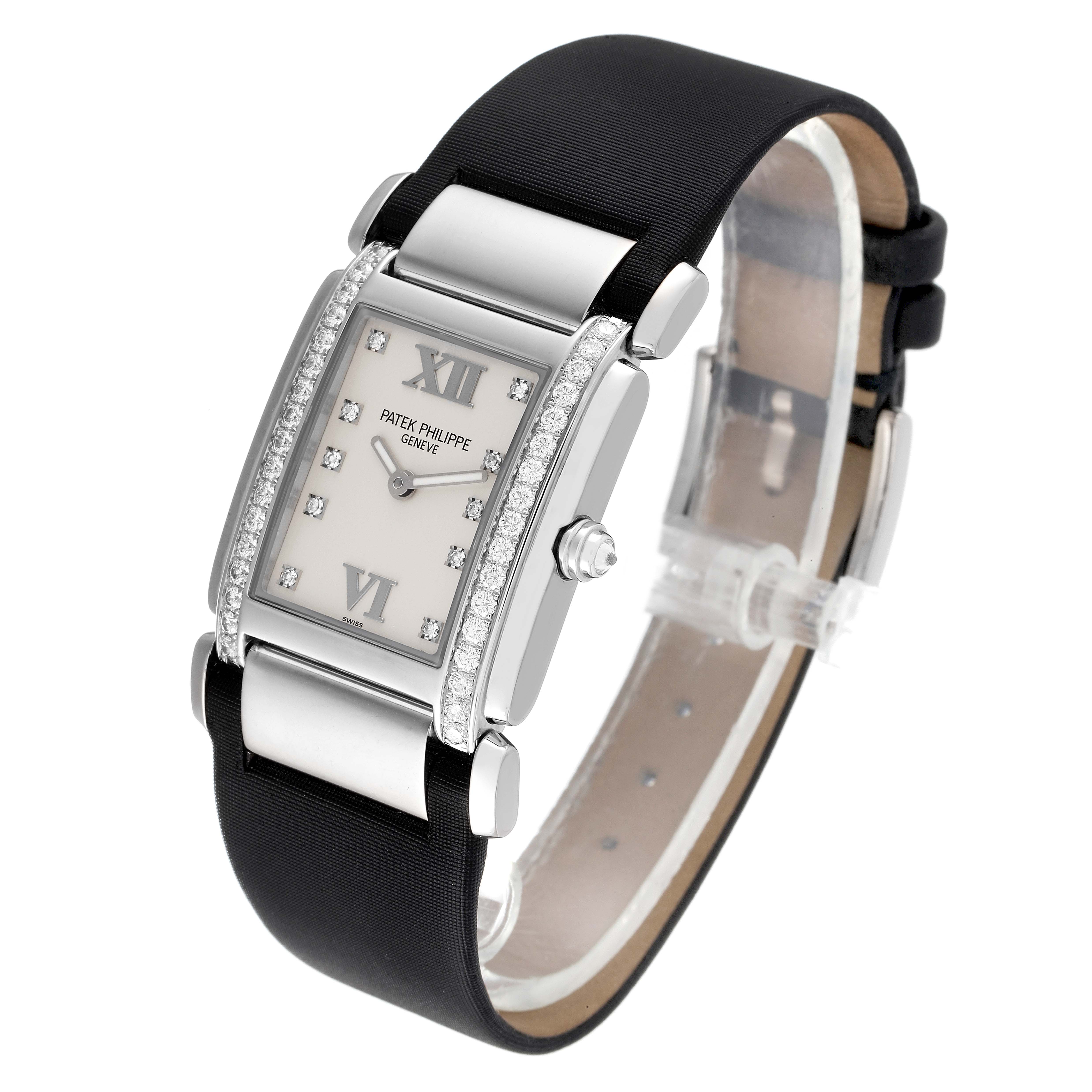 The image shows a Patek Philippe Twenty-4 4920G-010 Women's White Gold Silver Dial 4920G-010 Women's White Gold Silver Dial watch at a slight angle, highlighting the face, strap, bezel, and crown.