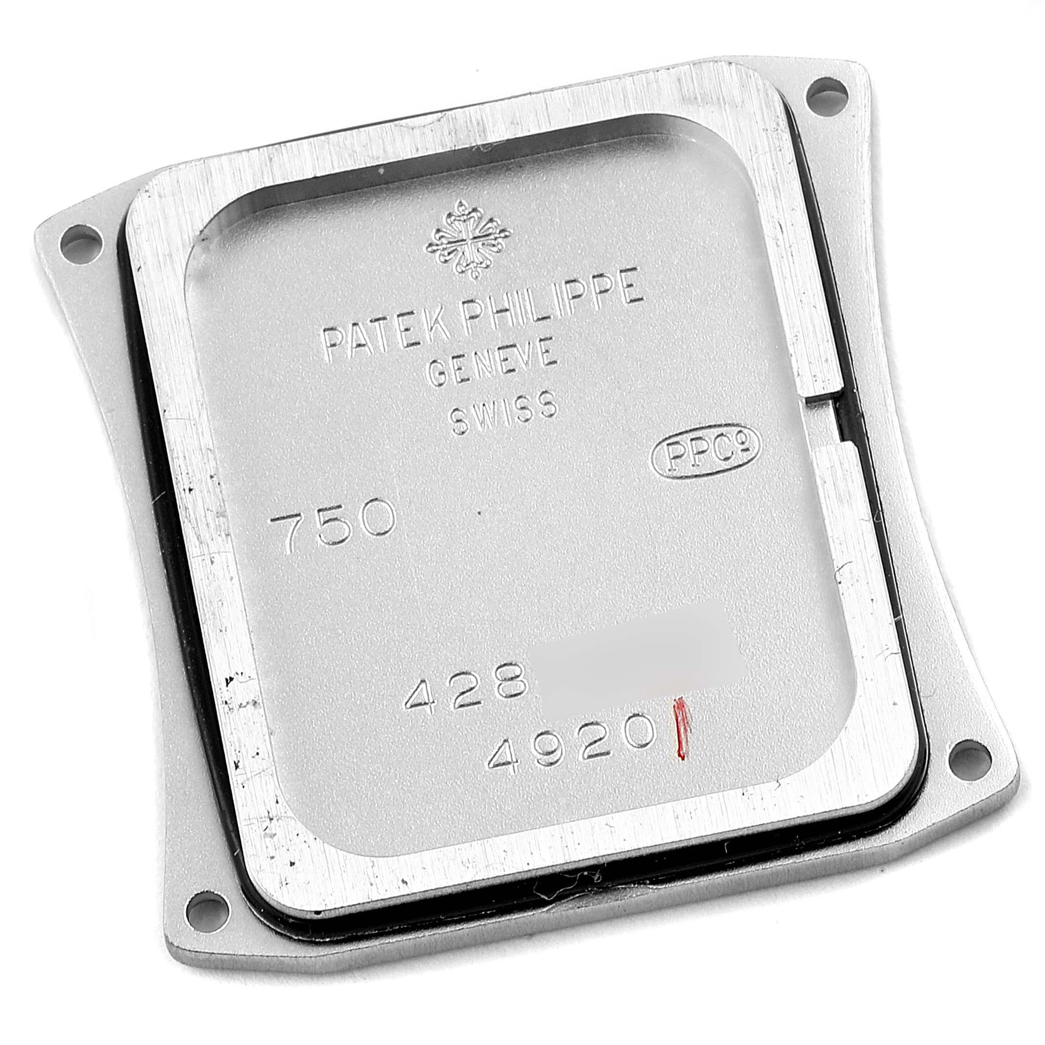 The image shows the back case of a Patek Philippe Twenty-4 4920G-010 Women's White Gold Silver Dial 4920G-010 Women's White Gold Silver Dial model watch.