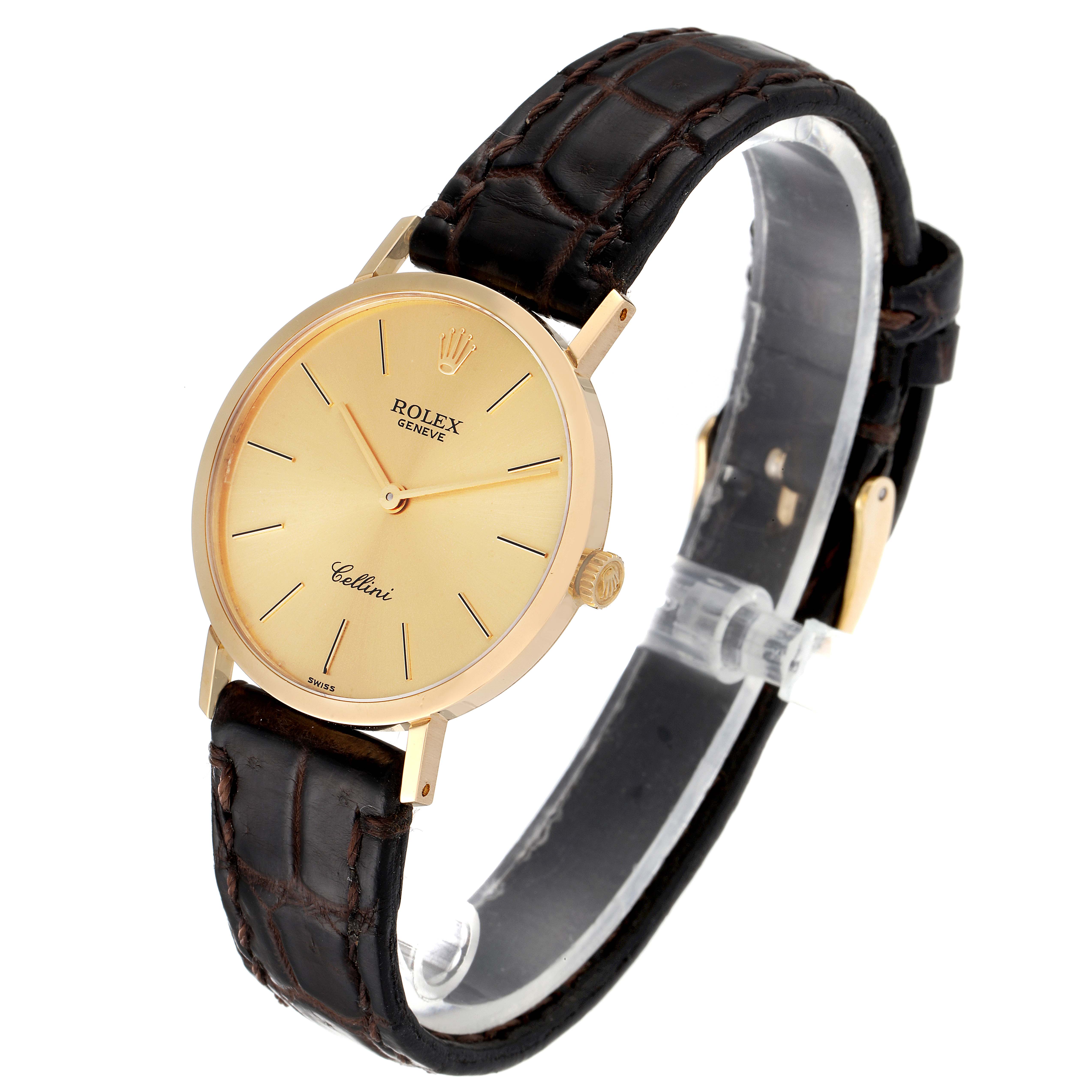 This image shows a side view of the Rolex Cellini 4112 Men's Yellow Gold Champagne Dial 4112 Men's Yellow Gold Champagne Dial watch, highlighting the dial, case, leather strap, and buckle.