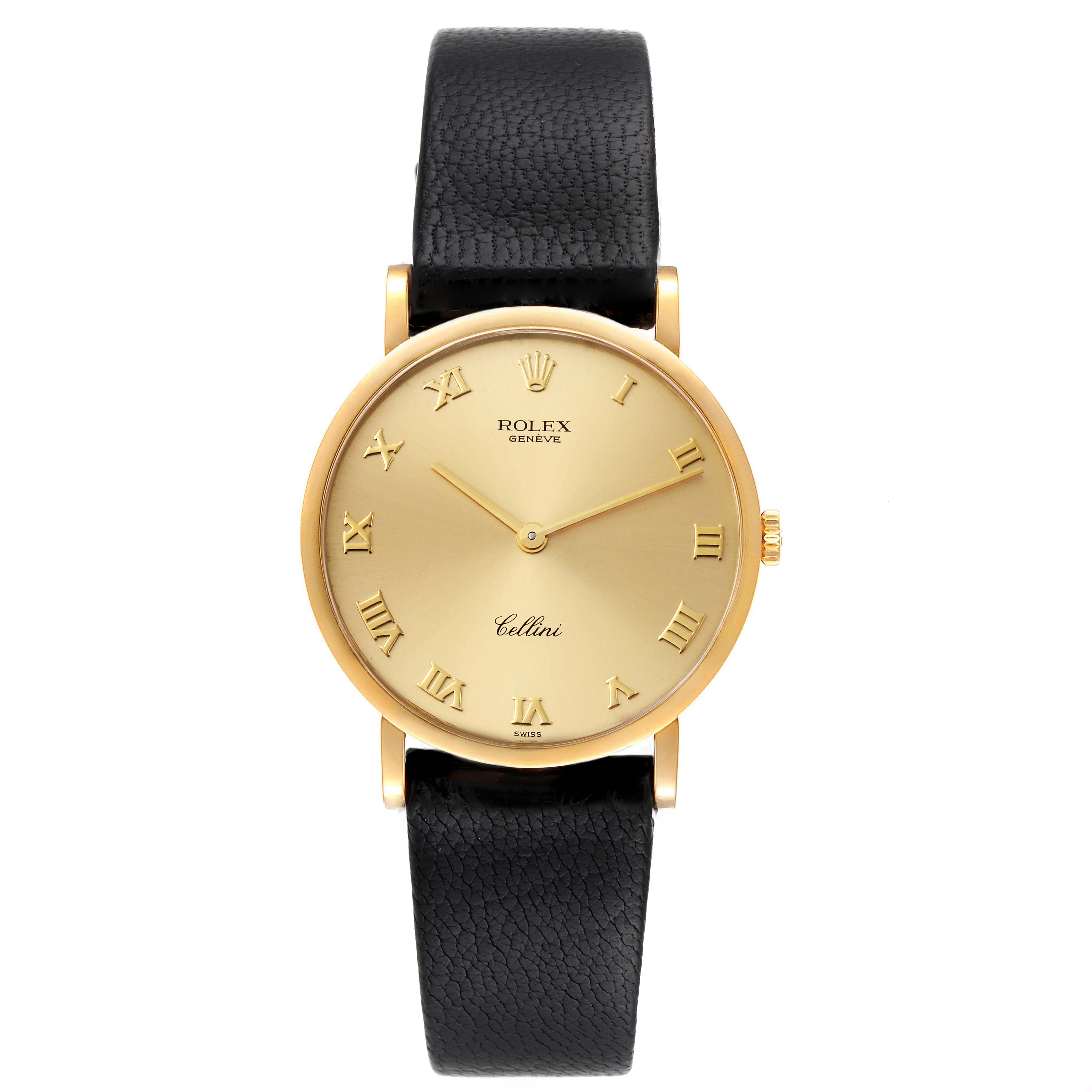 The image shows a frontal view of a Rolex Cellini 5112 Men's Yellow Gold Champagne Dial 5112 Men's Yellow Gold Champagne Dial watch with a golden dial, Roman numerals, and a black leather strap.
