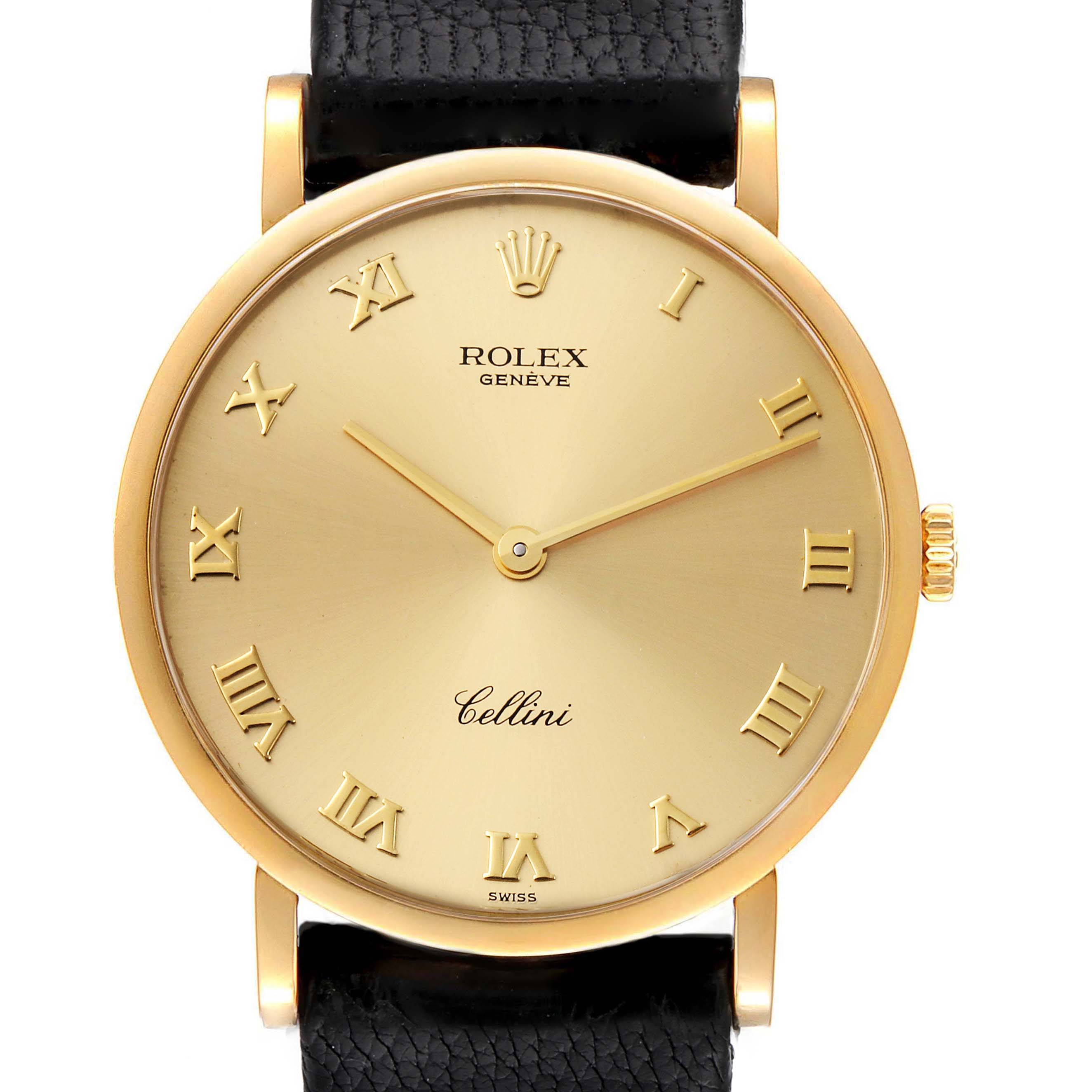 The image shows a front view of a Rolex Cellini 5112 Men's Yellow Gold Champagne Dial 5112 Men's Yellow Gold Champagne Dial watch, displaying its gold dial with Roman numerals and black leather strap.