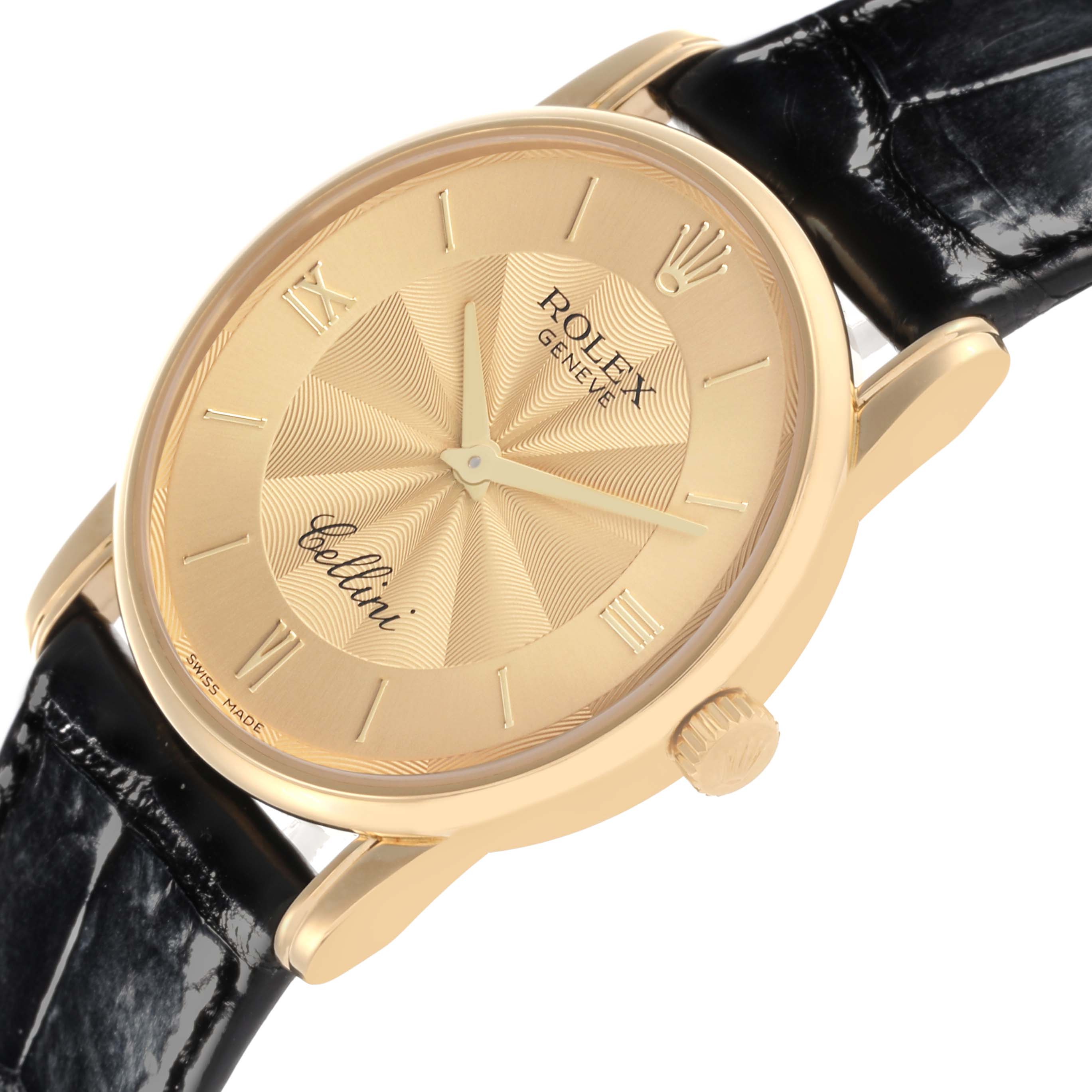 The Rolex Cellini 5116/8 Men
s Yellow Gold Champagne Dial 5116/8 Men
s Yellow Gold Champagne Dial watch is shown from an angled side view, highlighting its gold case, dial, and black leather strap.