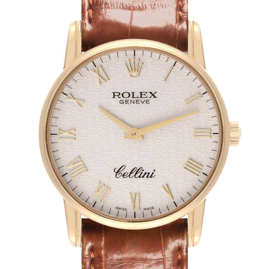 The Rolex Cellini watch is shown from the front, highlighting its dial, hands, case, and part of the leather strap.