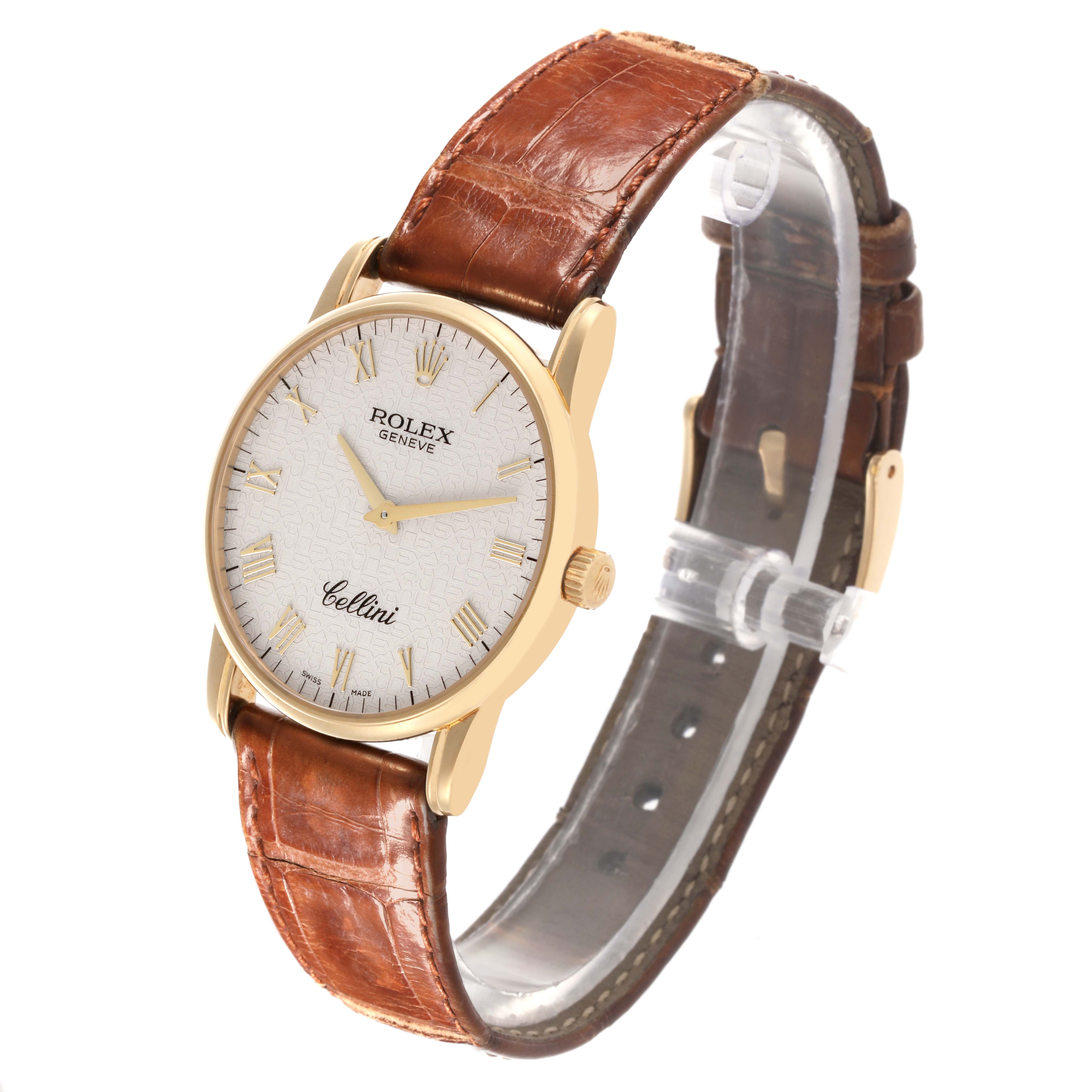 The Rolex Cellini 5116/8 Men
s Yellow Gold Beige Dial 5116/8 Men
s Yellow Gold Beige Dial watch is shown at a slight angle, displaying the face, crown, and leather strap.