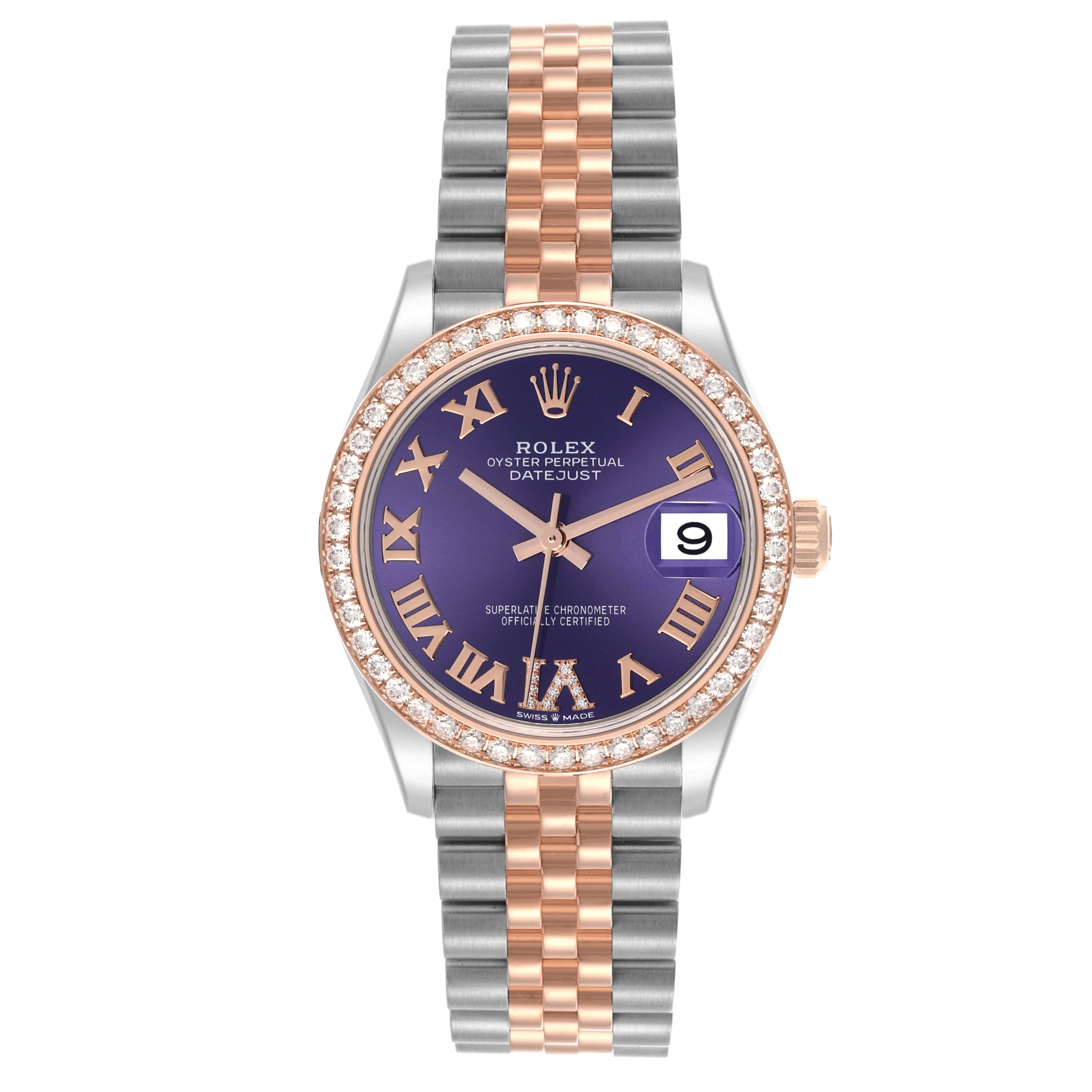 The Rolex Mid-Size 278381RBR-0020 Women's Steel and Gold (two tone) Purple Dial watch is shown from a top-down view, highlighting its purple dial, diamond bezel, and two-tone bracelet.
