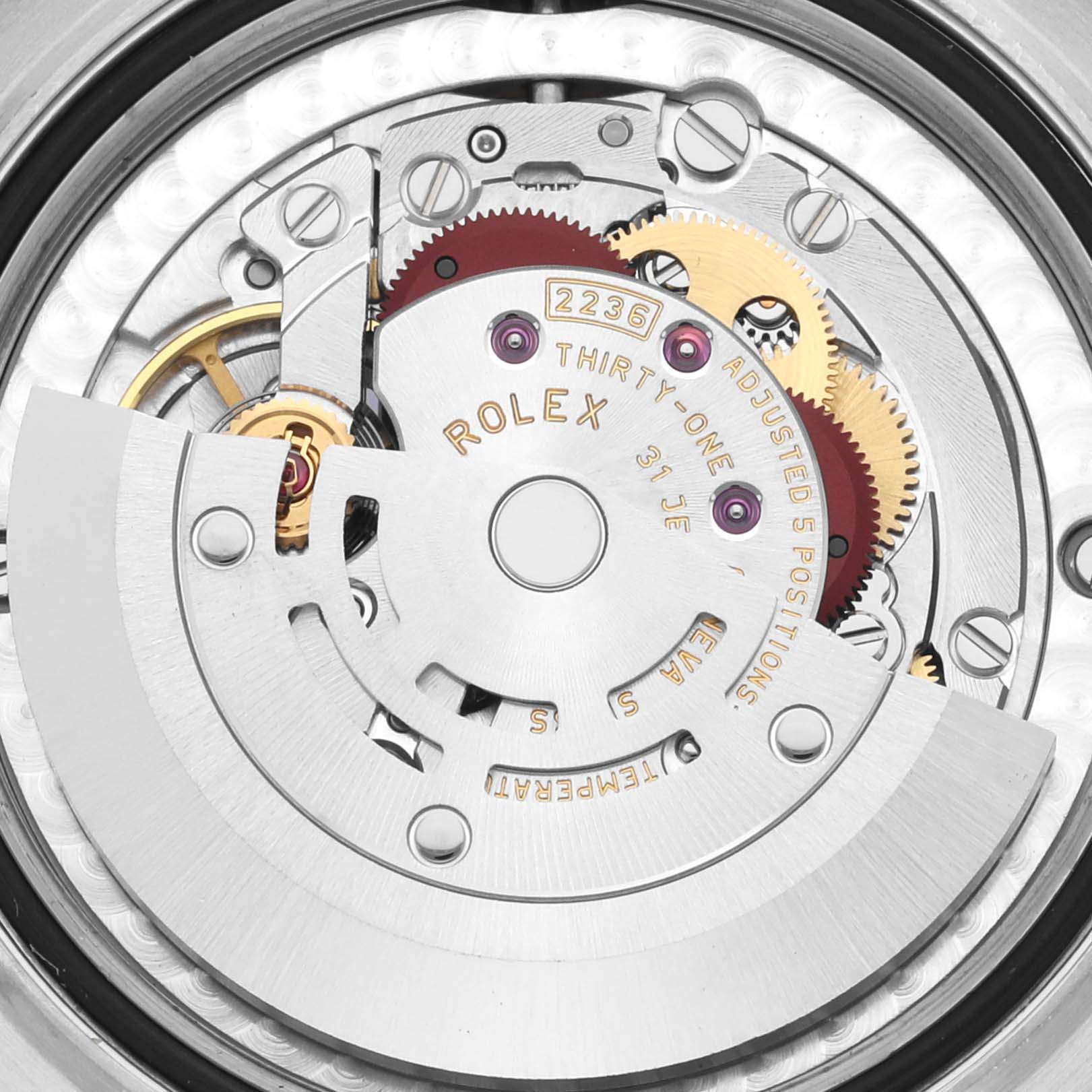 This image shows the intricate internal movement of a Rolex Mid-Size 278381RBR-0020 Women
s Steel and Gold (two tone) Purple Dial 278381RBR-0020 Women
s Steel and Gold (two tone) Purple Dial model, viewed from a top-down angle.