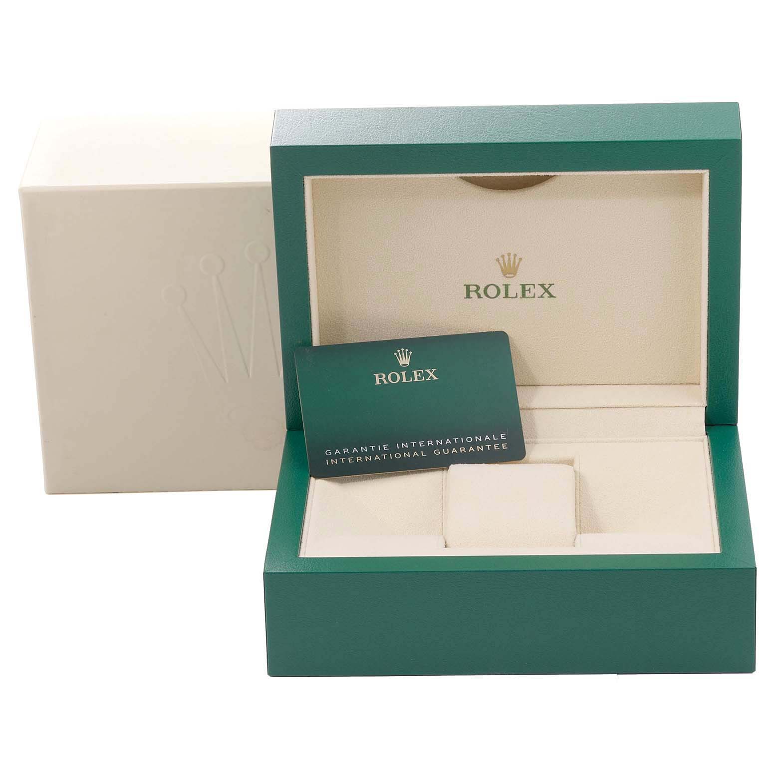 The image shows the packaging and warranty card for a Rolex Datejust 41 126300 Men
s Stainless Steel Grey Dial 126300 Men
s Stainless Steel Grey Dial model watch.