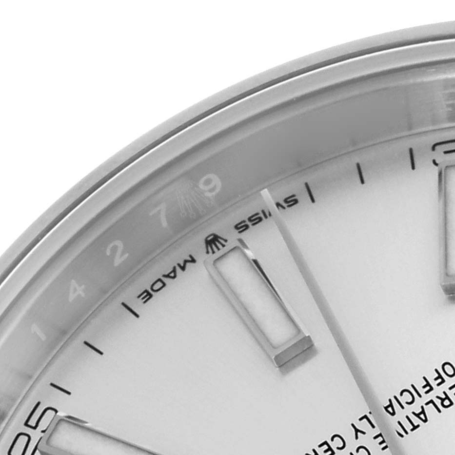 The image shows a close-up of the dial edge and markers of a Rolex Datejust 41 126300 Men
s Stainless Steel Silver Dial 126300 Men
s Stainless Steel Silver Dial, focusing on the "Swiss Made" text.