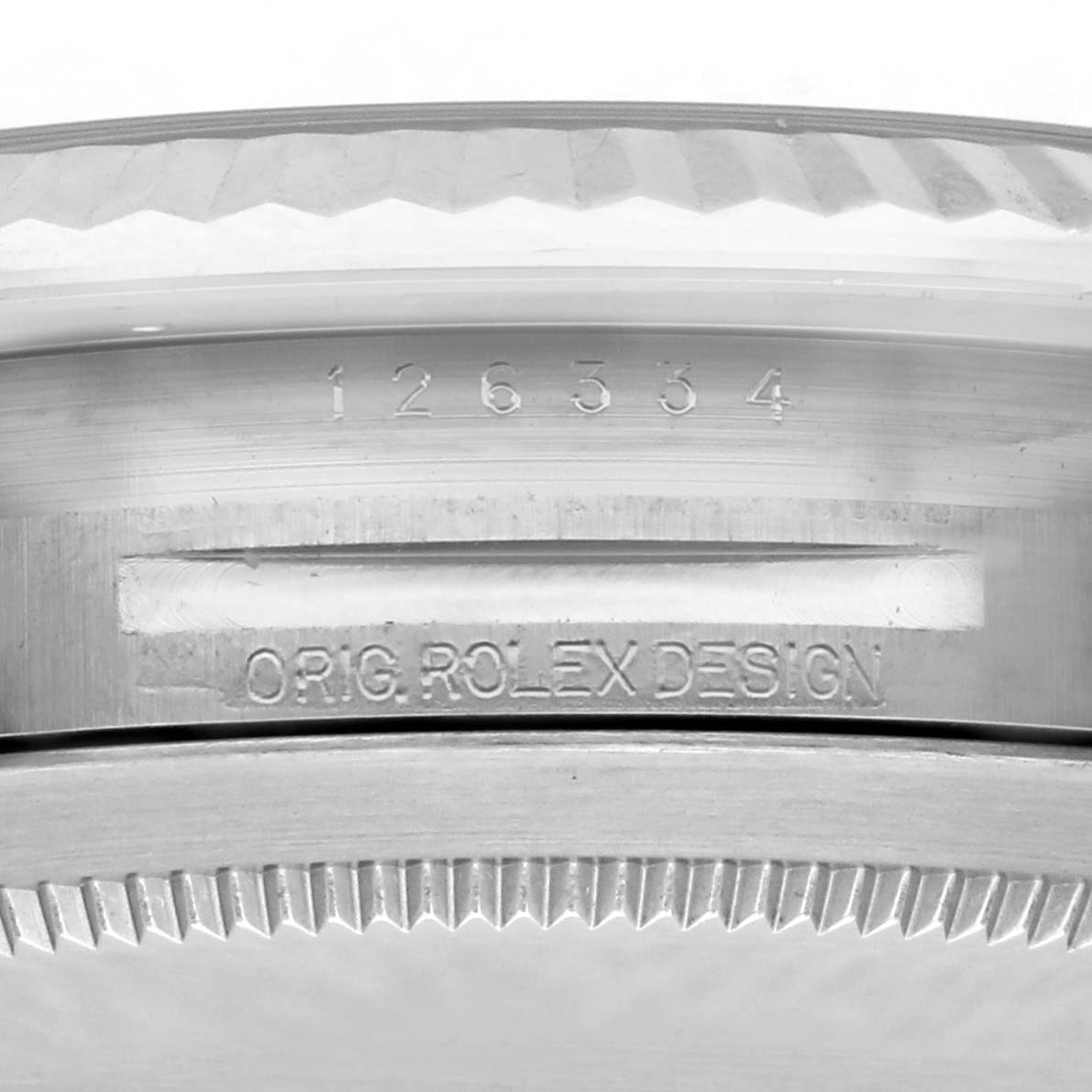 The image shows a close-up of the case side of a Rolex Datejust 41 126334 Men's Stainless Steel White Dial 126334 Men's Stainless Steel White Dial, highlighting the serial number and "ORIG. ROLEX DESIGN" engraving.