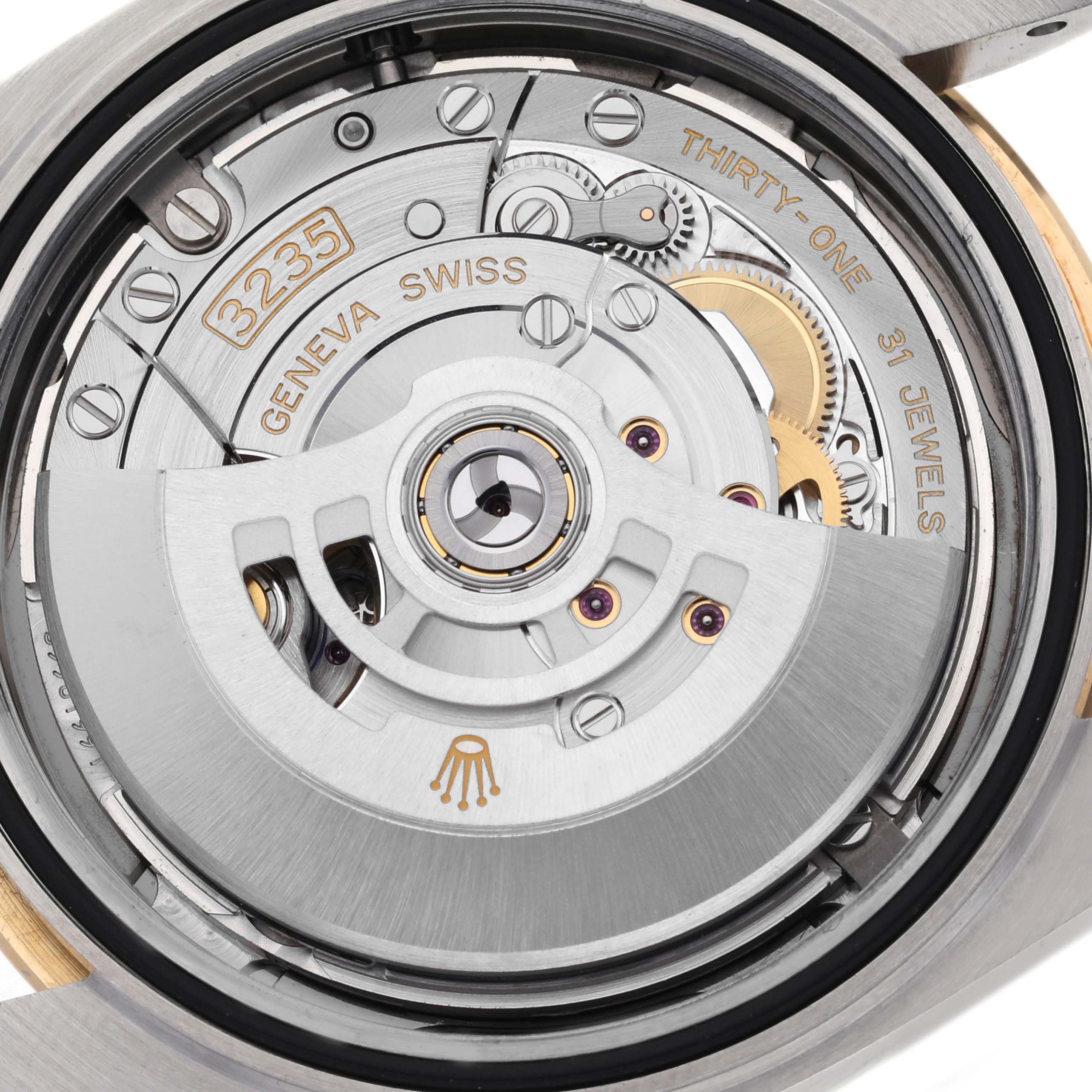 The image shows a close-up of the Rolex Datejust 41 126333 Men's Steel and Gold (two tone) Grey Dial 126333 Men's Steel and Gold (two tone) Grey Dial movement from the back, highlighting the rotor and internal mechanics.