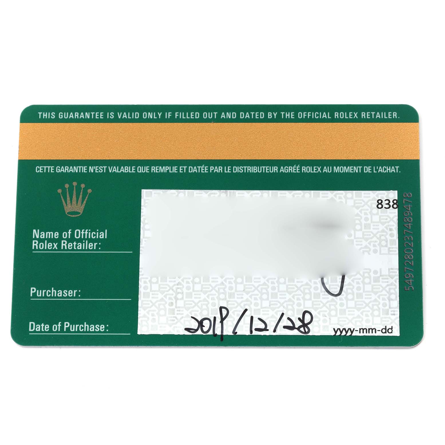 The image shows a green Rolex warranty card for the Datejust 41 model from an overhead angle.