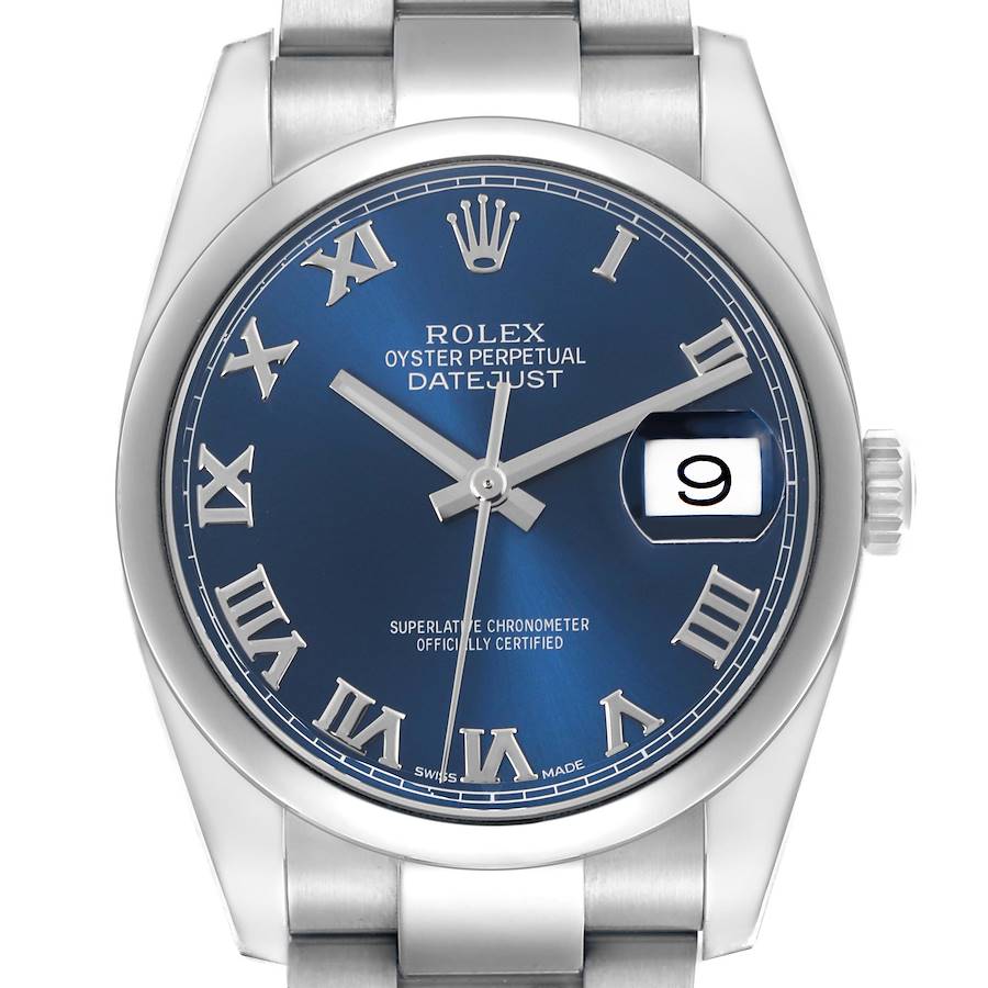 The image shows a front angle of the Rolex Datejust, highlighting its blue dial, Roman numerals, date, and bezel.