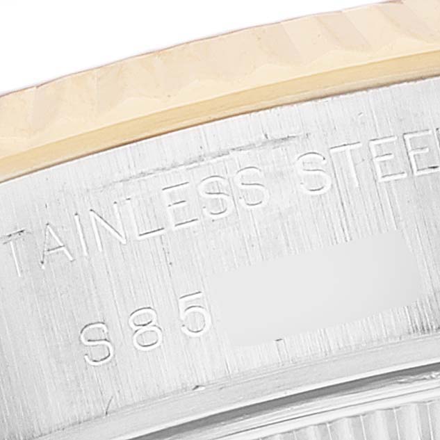 This close-up image shows the case back engraving of the Rolex Datejust 69173 Women's Steel and Gold (two tone) Champagne Dial 69173 Women's Steel and Gold (two tone) Champagne Dial watch, highlighting the "Stainless Steel S85" text.