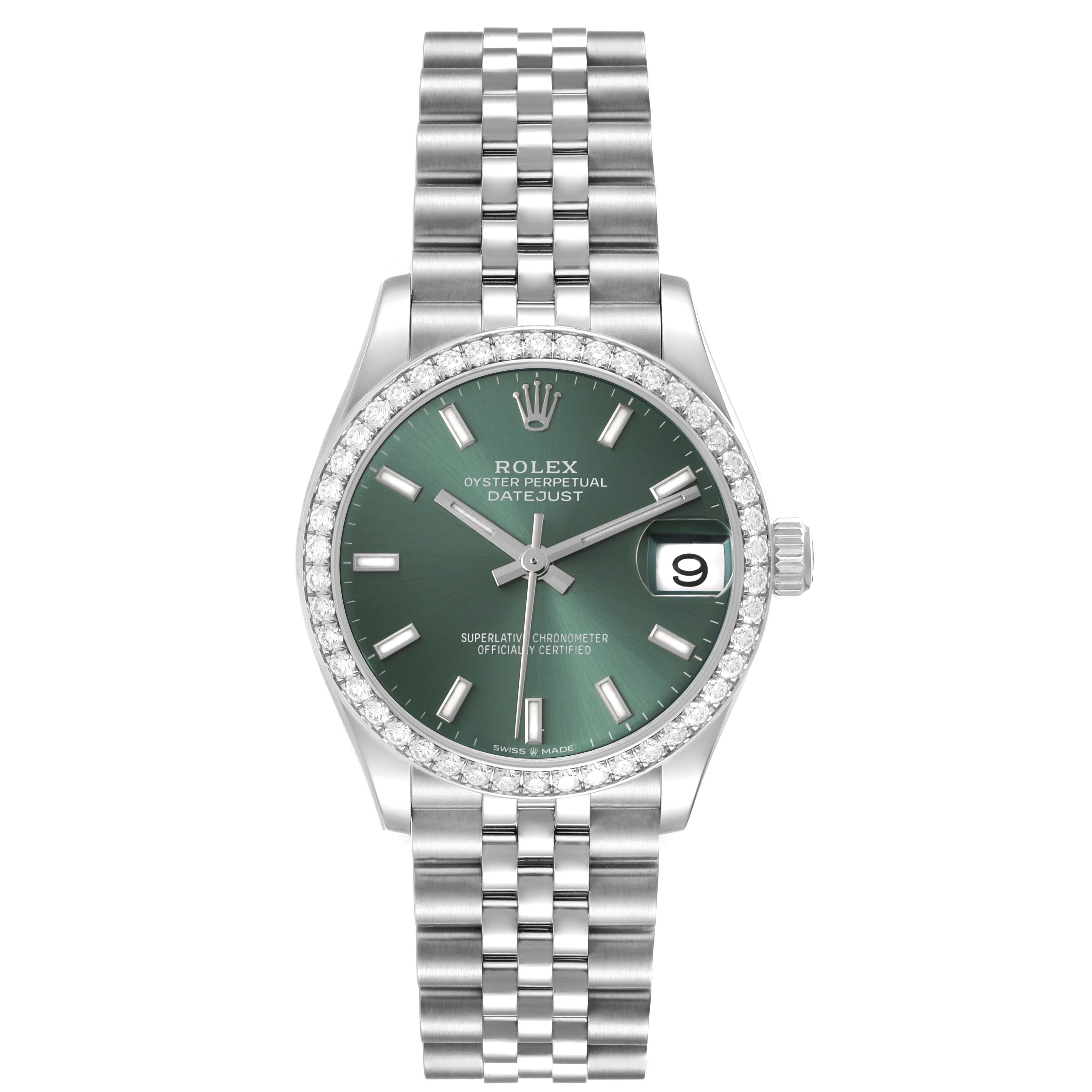 The Rolex Datejust Mid-Size is shown from a front angle, displaying its green dial, date window, and jubilee bracelet.