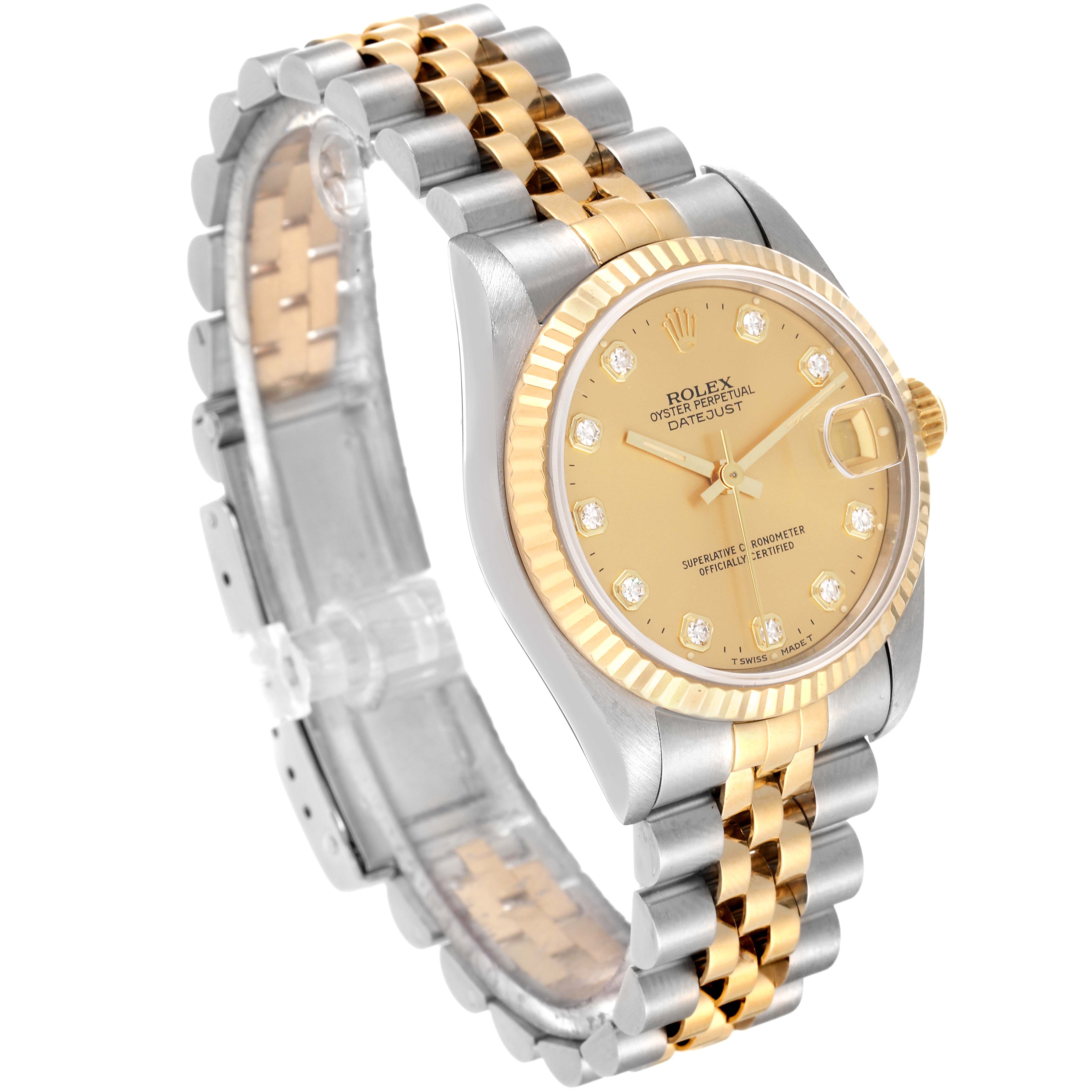 This Rolex Mid-Size 68273 Women
s Steel and Gold (two tone) Champagne Dial 68273 Women
s Steel and Gold (two tone) Champagne Dial Datejust watch is shown at an angle displaying the face, bezel, and two-tone bracelet.
