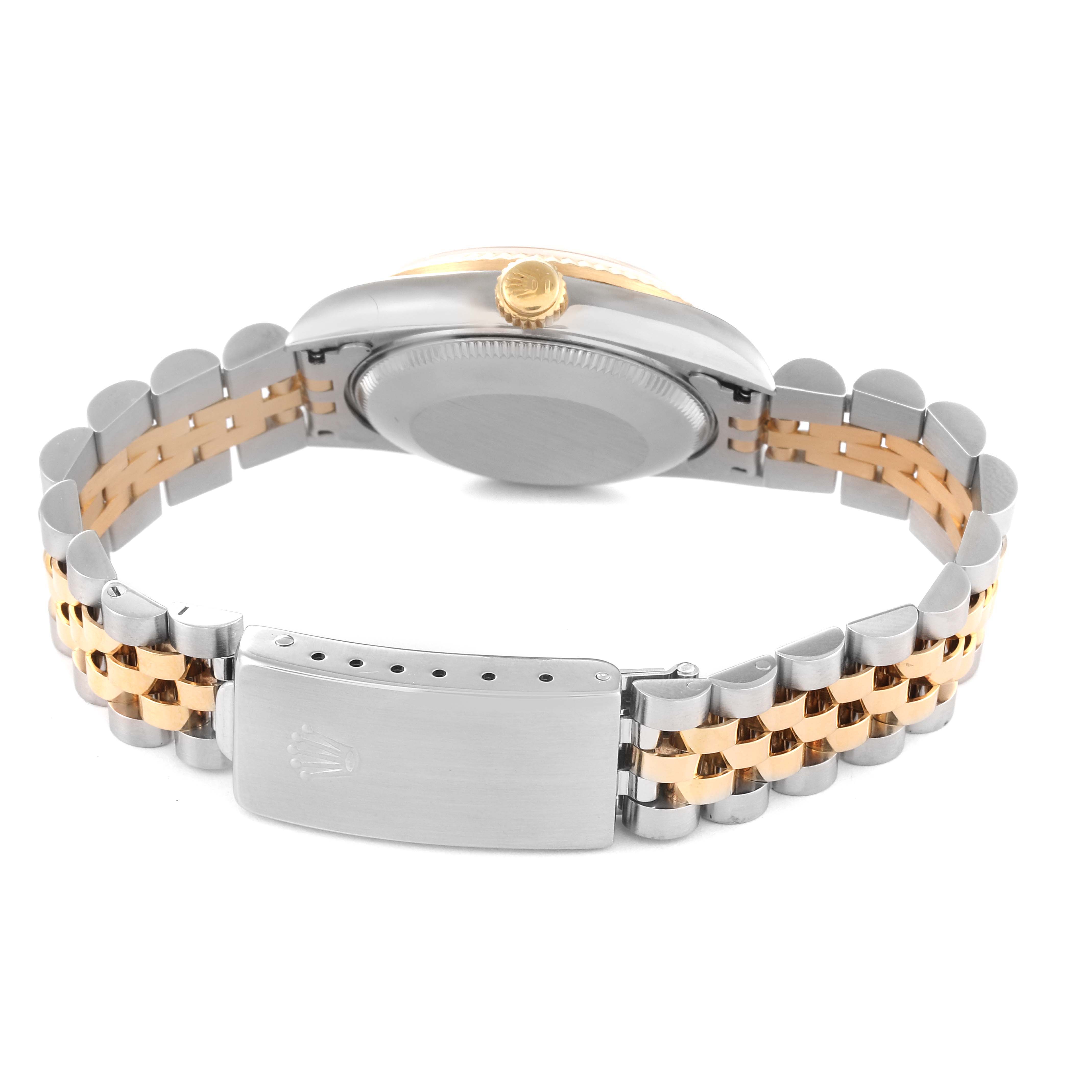 The image shows the back view of a Rolex Mid-Size 68273 Women
s Steel and Gold (two tone) Champagne Dial 68273 Women
s Steel and Gold (two tone) Champagne Dial model with the bracelet and clasp visible.