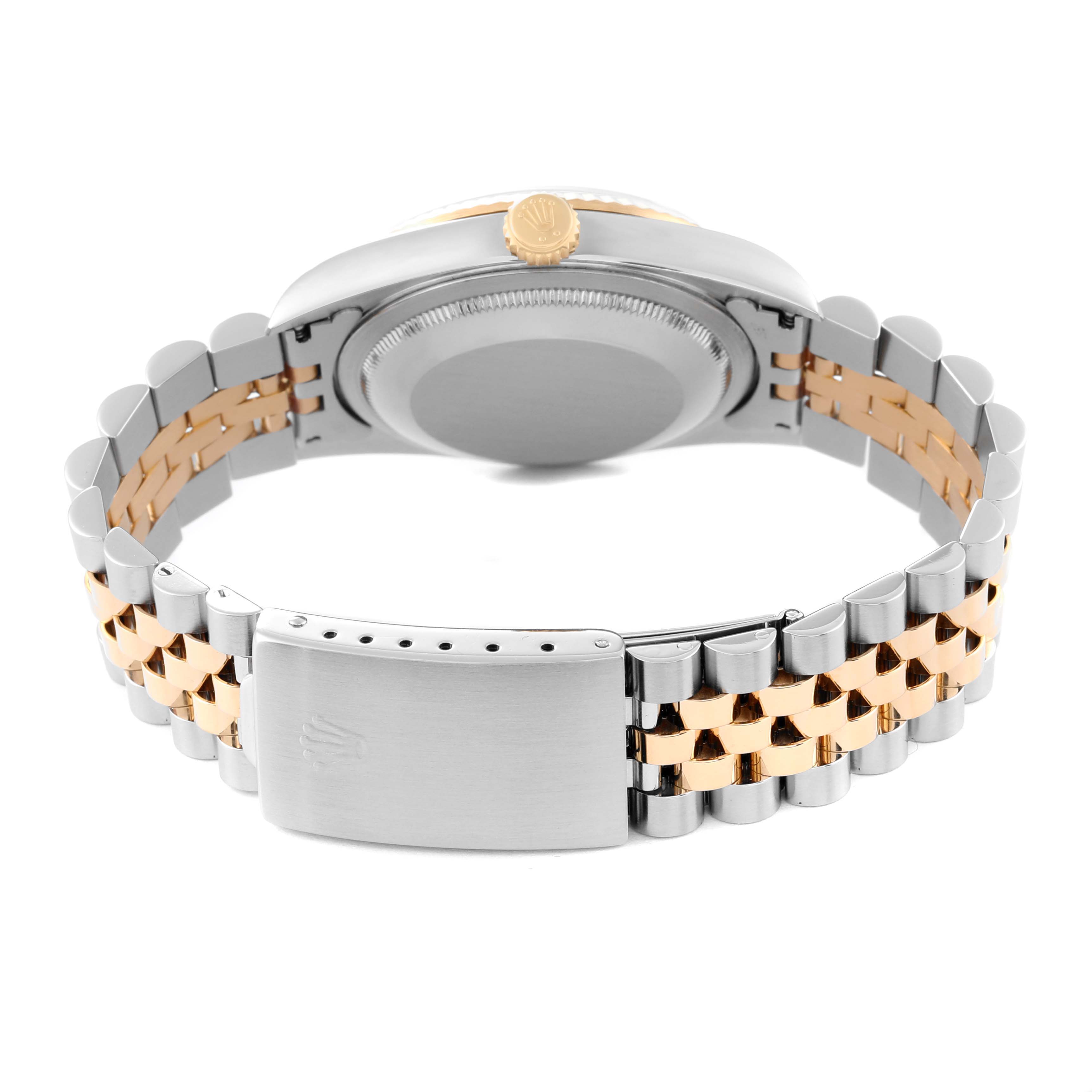 The image shows the back view of a Rolex Datejust 16233 Men's Steel and Gold (two tone) Grey Dial 16233 Men's Steel and Gold (two tone) Grey Dial watch, highlighting its clasp and two-tone metal bracelet.