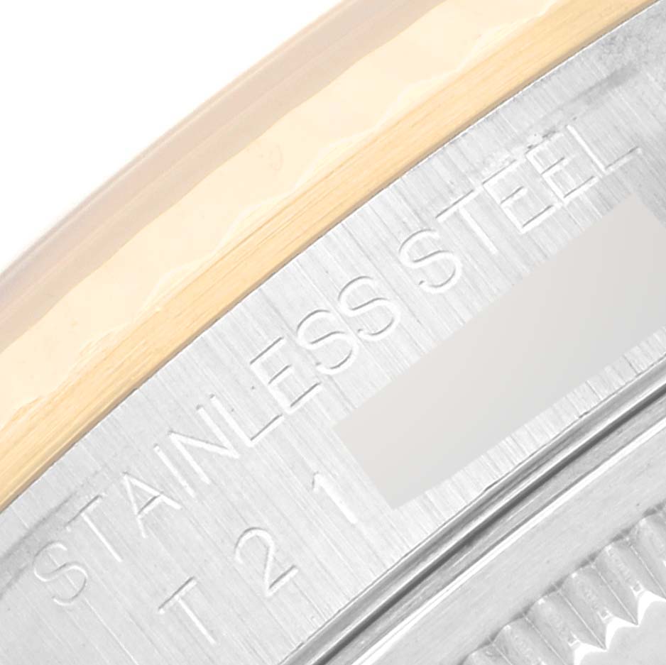 This image shows a close-up of the bevel and part of the casing of a Rolex Datejust 16233 Men's Steel and Gold (two tone) Grey Dial 16233 Men's Steel and Gold (two tone) Grey Dial watch, highlighting its stainless steel construction.