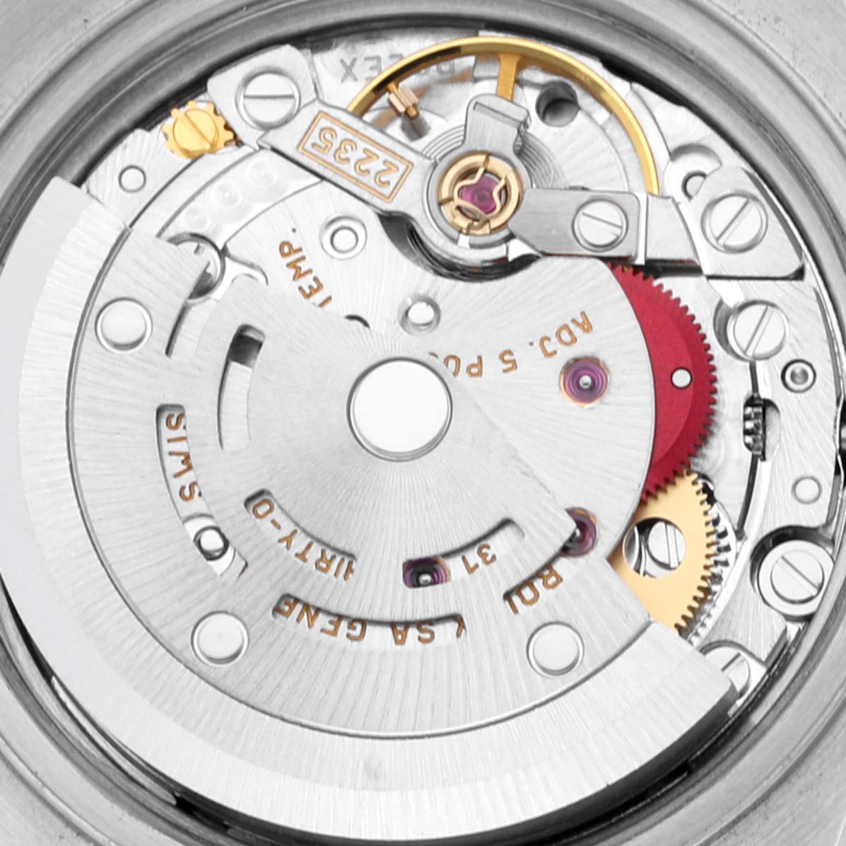 This is a close-up view of the movement of a Rolex Datejust 79163 Women's Steel and Gold (two tone) Champagne Dial 79163 Women's Steel and Gold (two tone) Champagne Dial watch, showing intricate gears and mechanical parts.