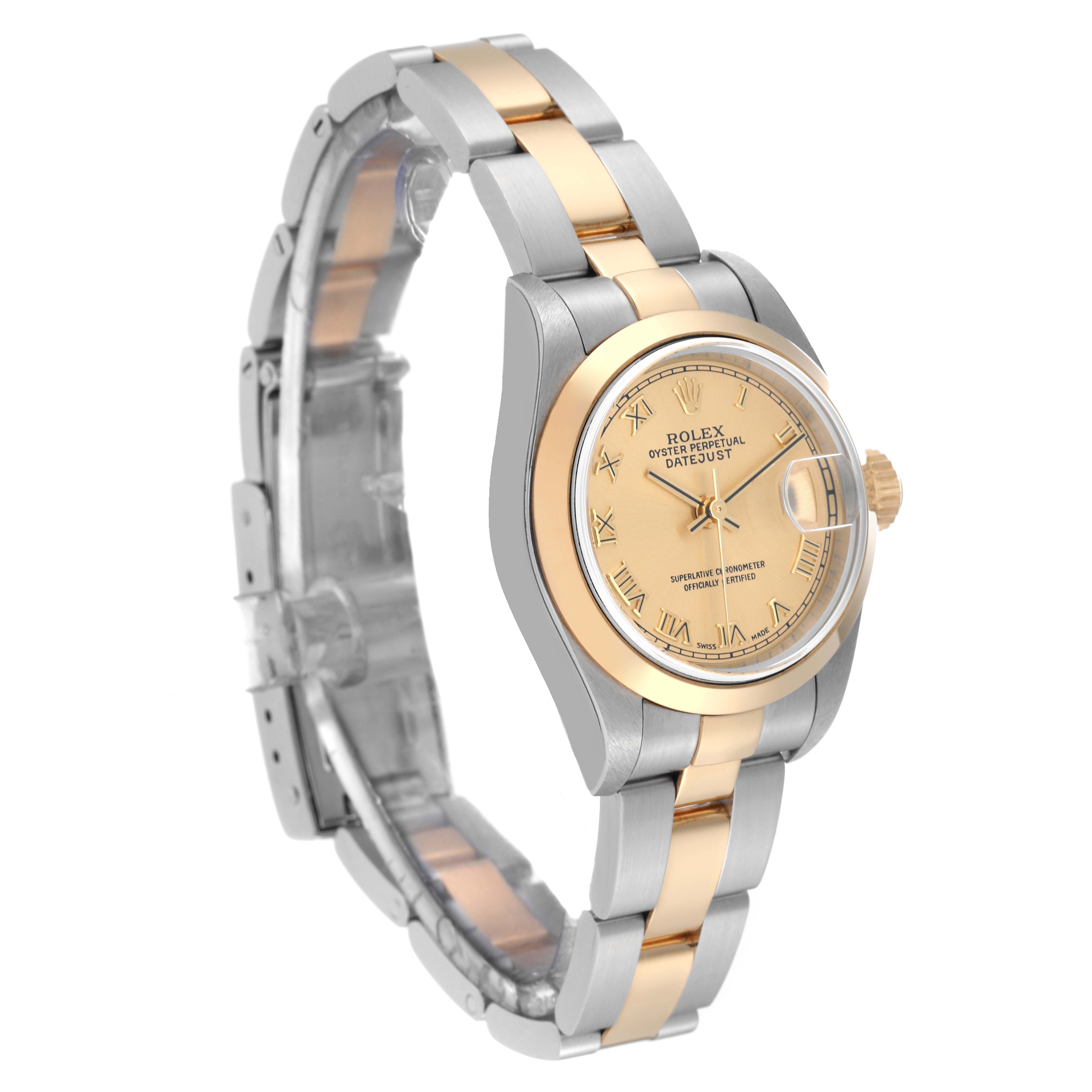 This image shows a side angle of a Rolex Datejust 79163 Women's Steel and Gold (two tone) Champagne Dial 79163 Women's Steel and Gold (two tone) Champagne Dial watch, highlighting the bezel, dial, and partially open bracelet.