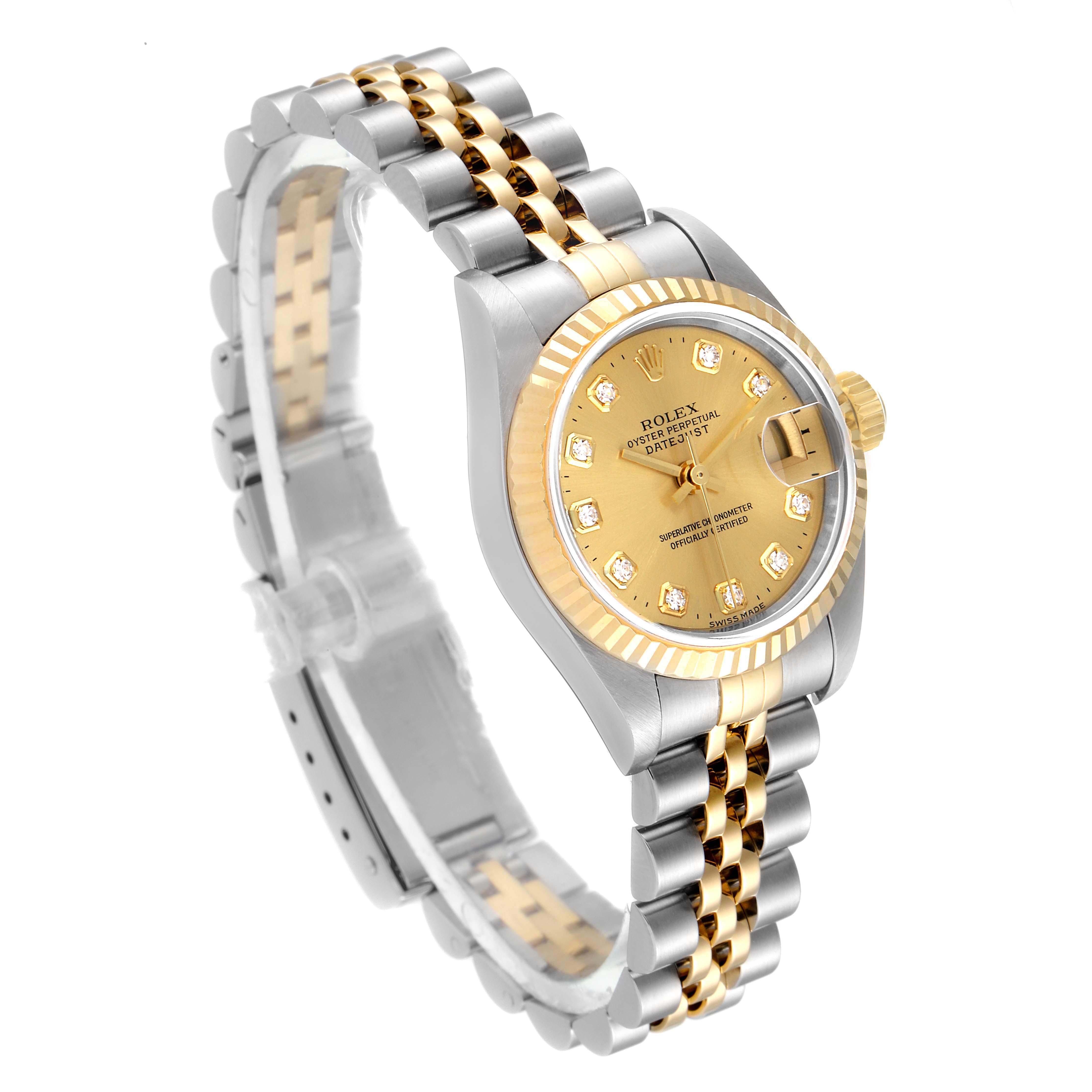 The image shows a Rolex Datejust 79173 Women
s Steel and Gold (two tone) Champagne Dial 79173 Women
s Steel and Gold (two tone) Champagne Dial watch from a tilted front angle, highlighting its gold and silver bracelet, dial, and bezel.