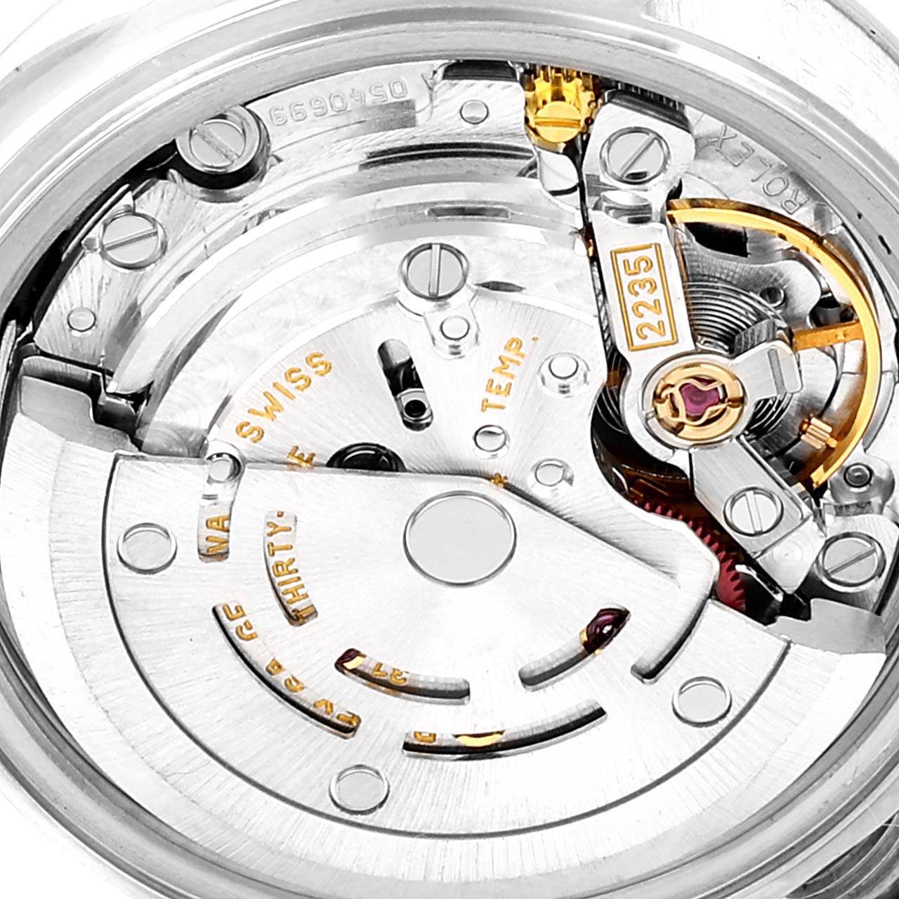 This image shows a close-up view of the movement mechanism of a Rolex Datejust 79173 Women
s Steel and Gold (two tone) Champagne Dial 79173 Women
s Steel and Gold (two tone) Champagne Dial watch.