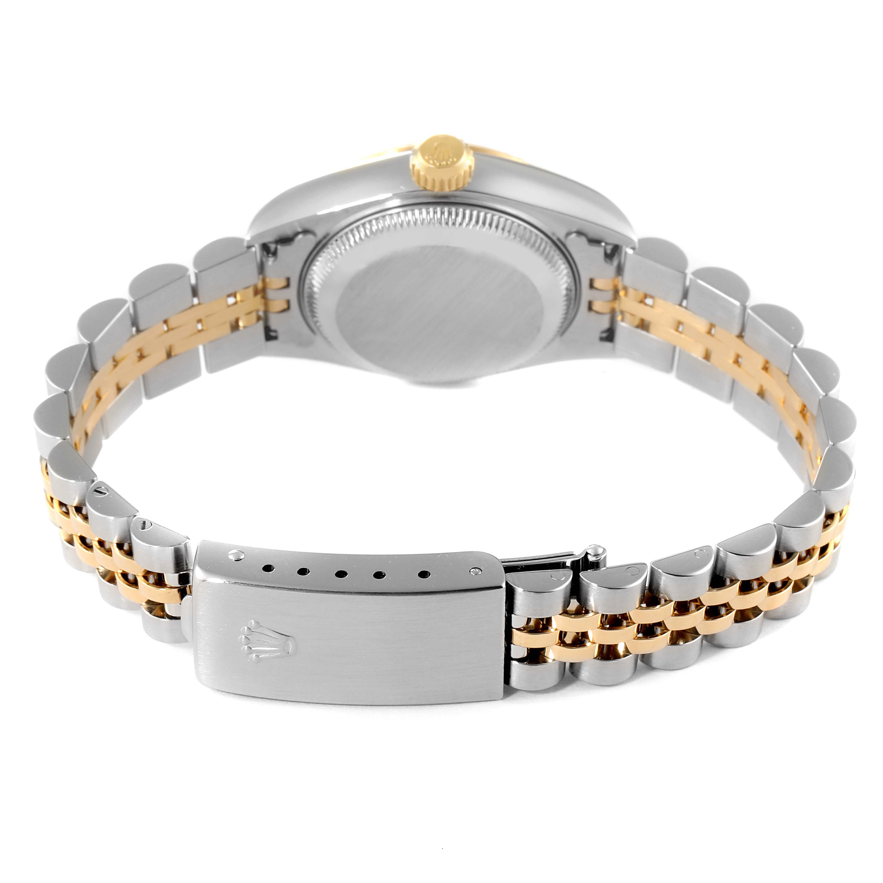 The image shows the back and clasp of a Rolex Datejust 79173 Women
s Steel and Gold (two tone) Champagne Dial 79173 Women
s Steel and Gold (two tone) Champagne Dial watch with a two-tone bracelet.