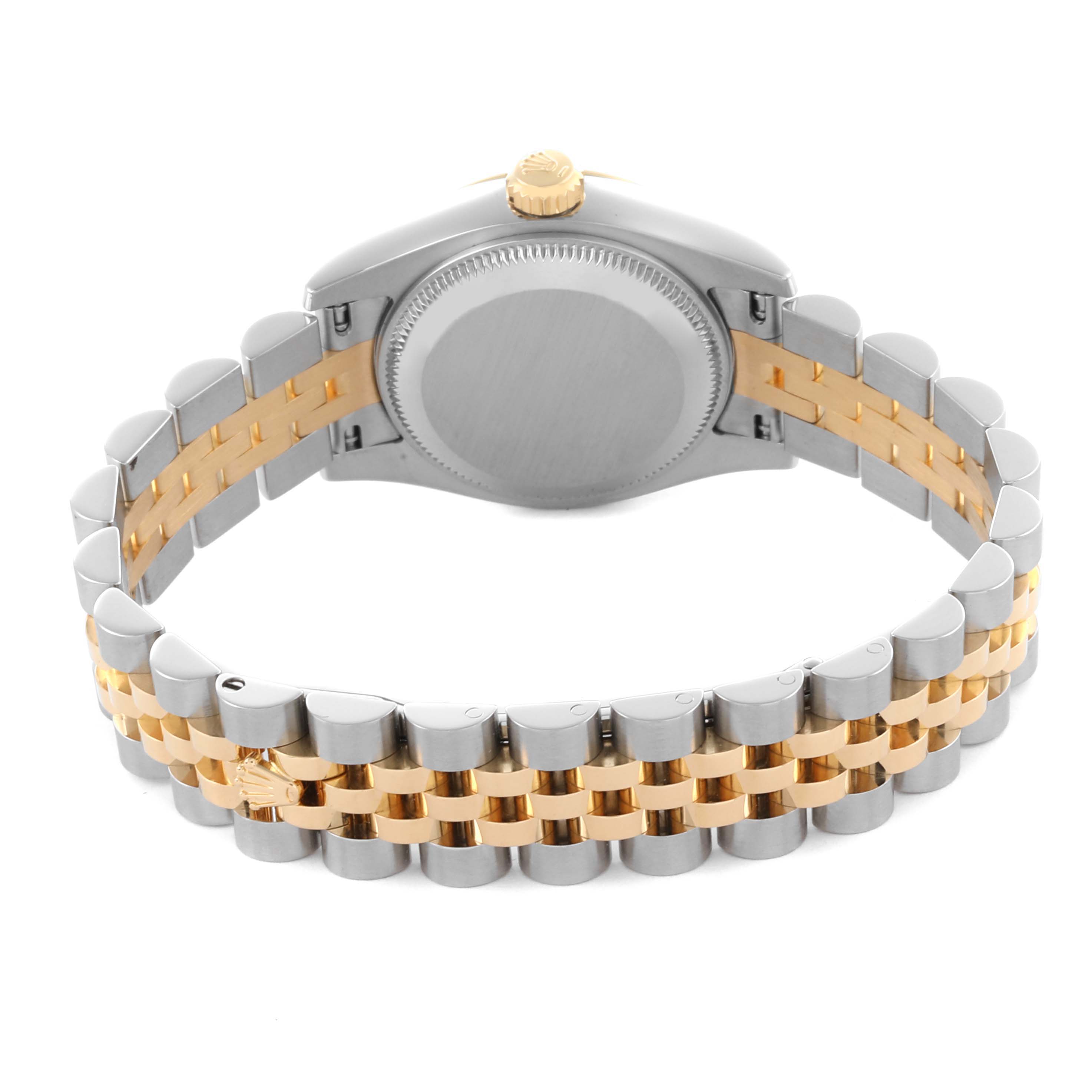 The Rolex Datejust 179173 Women
s Steel and Gold (two tone) White Dial 179173 Women
s Steel and Gold (two tone) White Dial watch is shown from the back, highlighting the case back and the two-tone Jubilee bracelet.