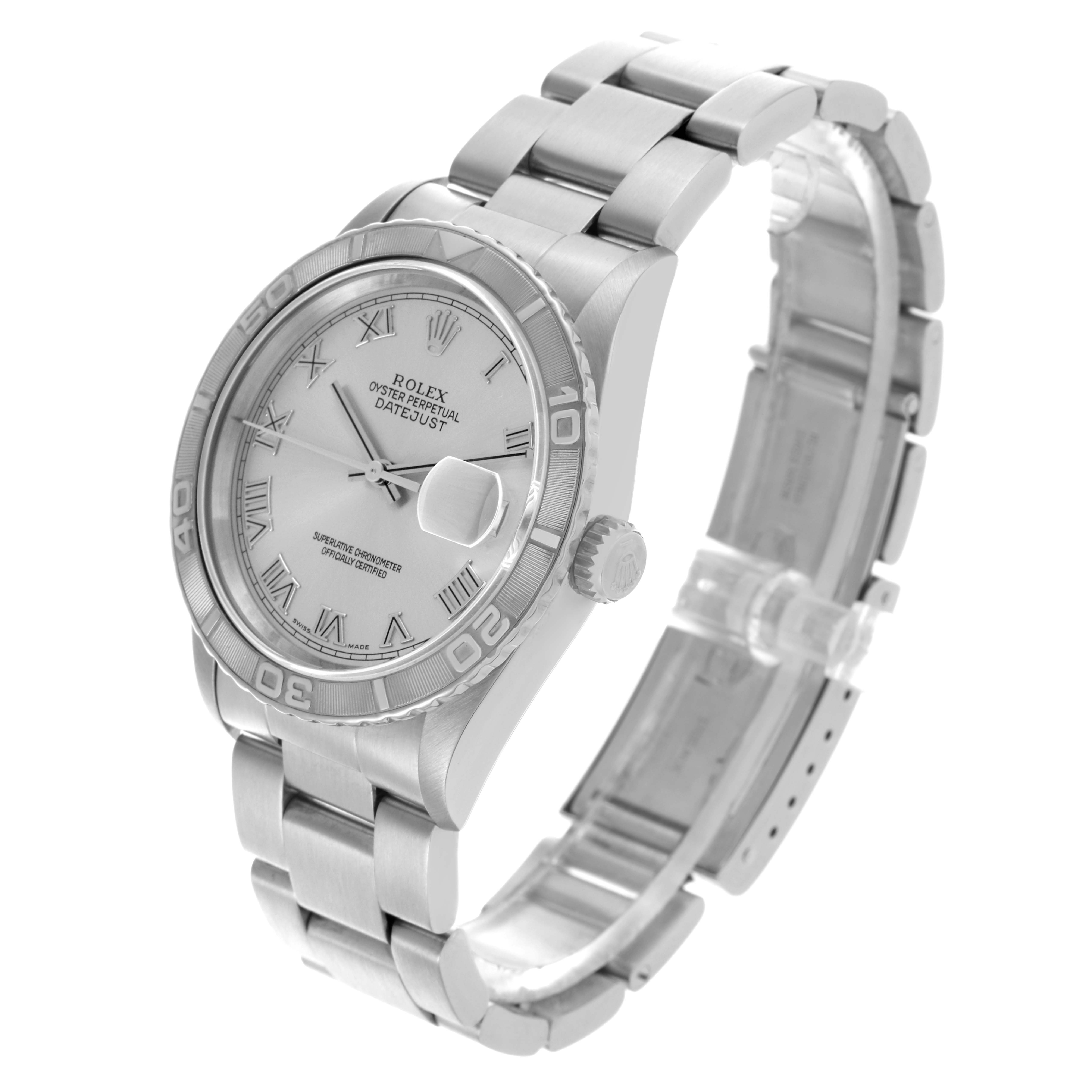The Rolex Datejust watch is shown at an angle displaying the face, bezel, case, bracelet, and crown.