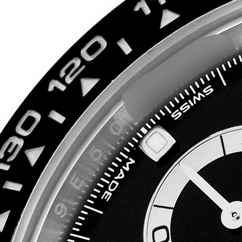 The image shows a close-up of the Rolex Datejust bezel and part of the watch face, focusing on indices and markers.