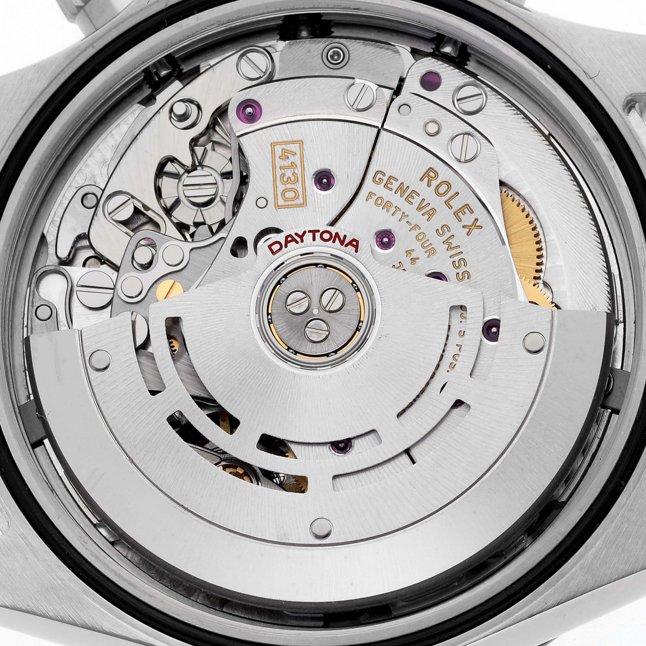 The image shows the movement of a Rolex Datejust watch, viewed from the back, highlighting the intricate mechanics.