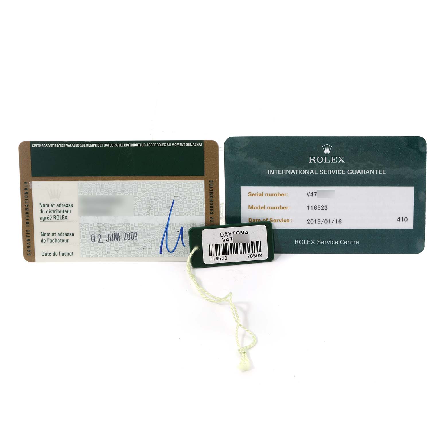 The image shows warranty and service cards along with a tag for a Rolex Daytona 116523 Men's Steel and Gold (two tone) Silver Dial 116523 Men's Steel and Gold (two tone) Silver Dial watch model.