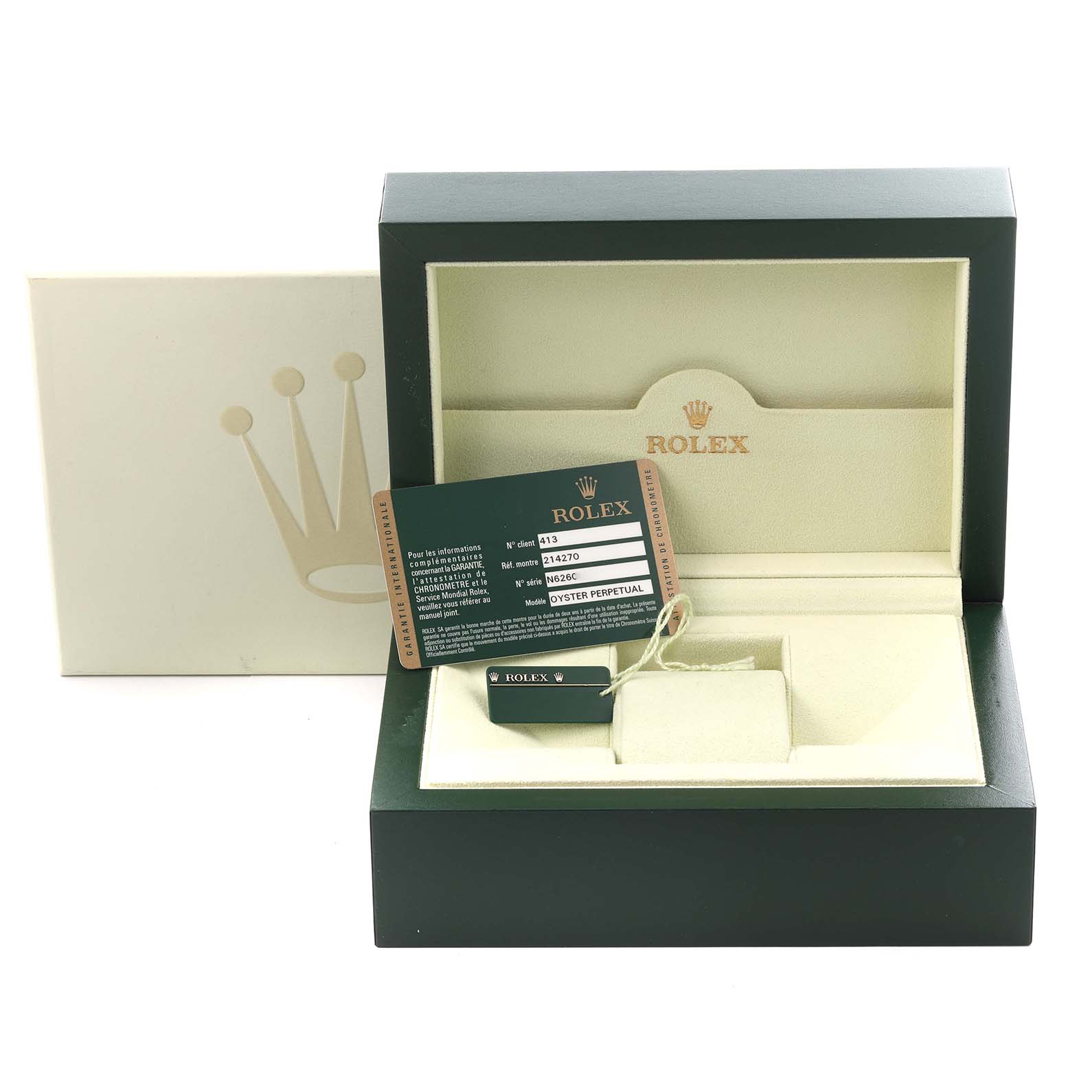 The image shows the box and accessories for a Rolex Explorer 214270 Men's Stainless Steel Black Dial 214270 Men's Stainless Steel Black Dial, including a card and tag, but not the watch itself.