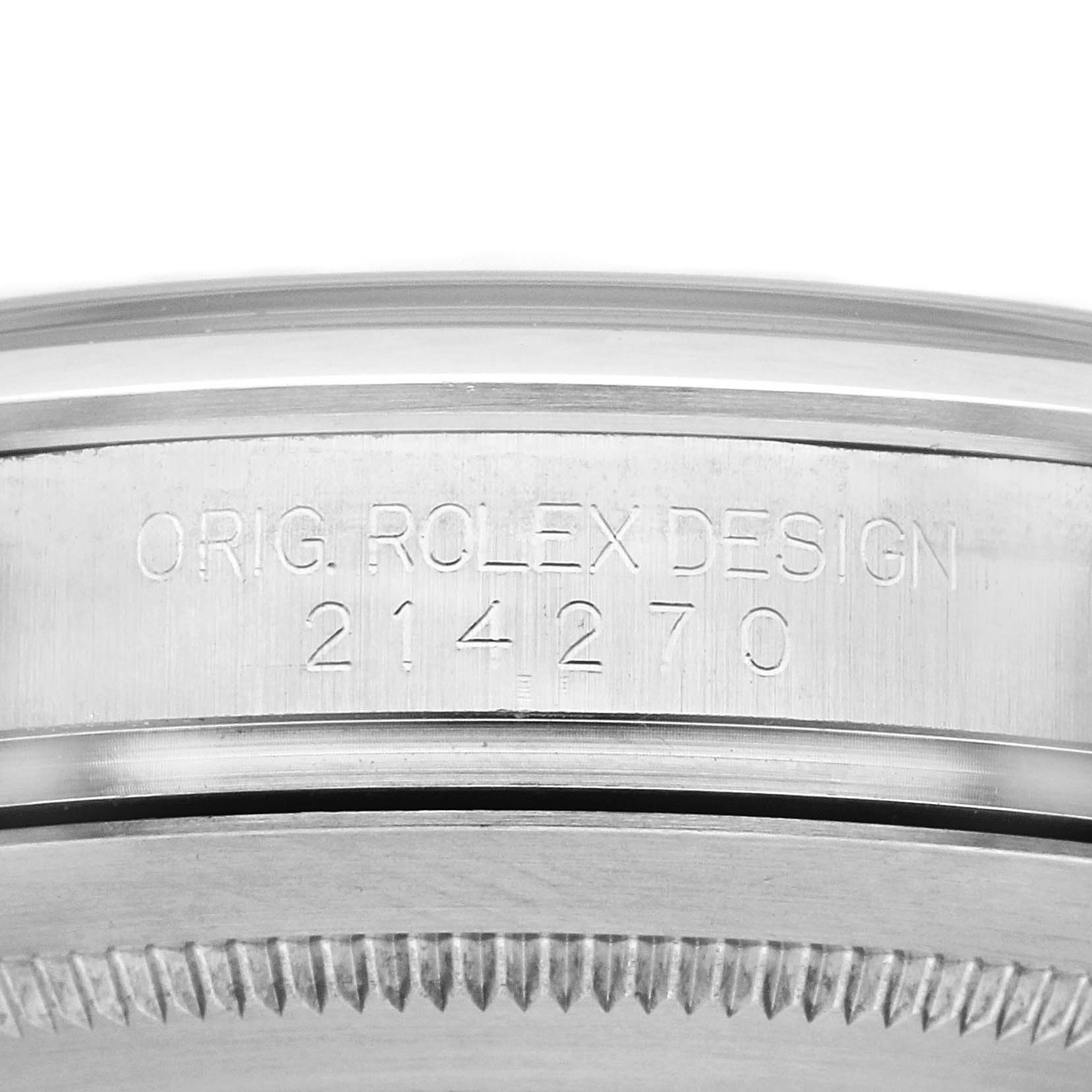 The image shows a side angle of the Rolex Explorer 214270 Men's Stainless Steel Black Dial 214270 Men's Stainless Steel Black Dial watch's case with its model number engraved.