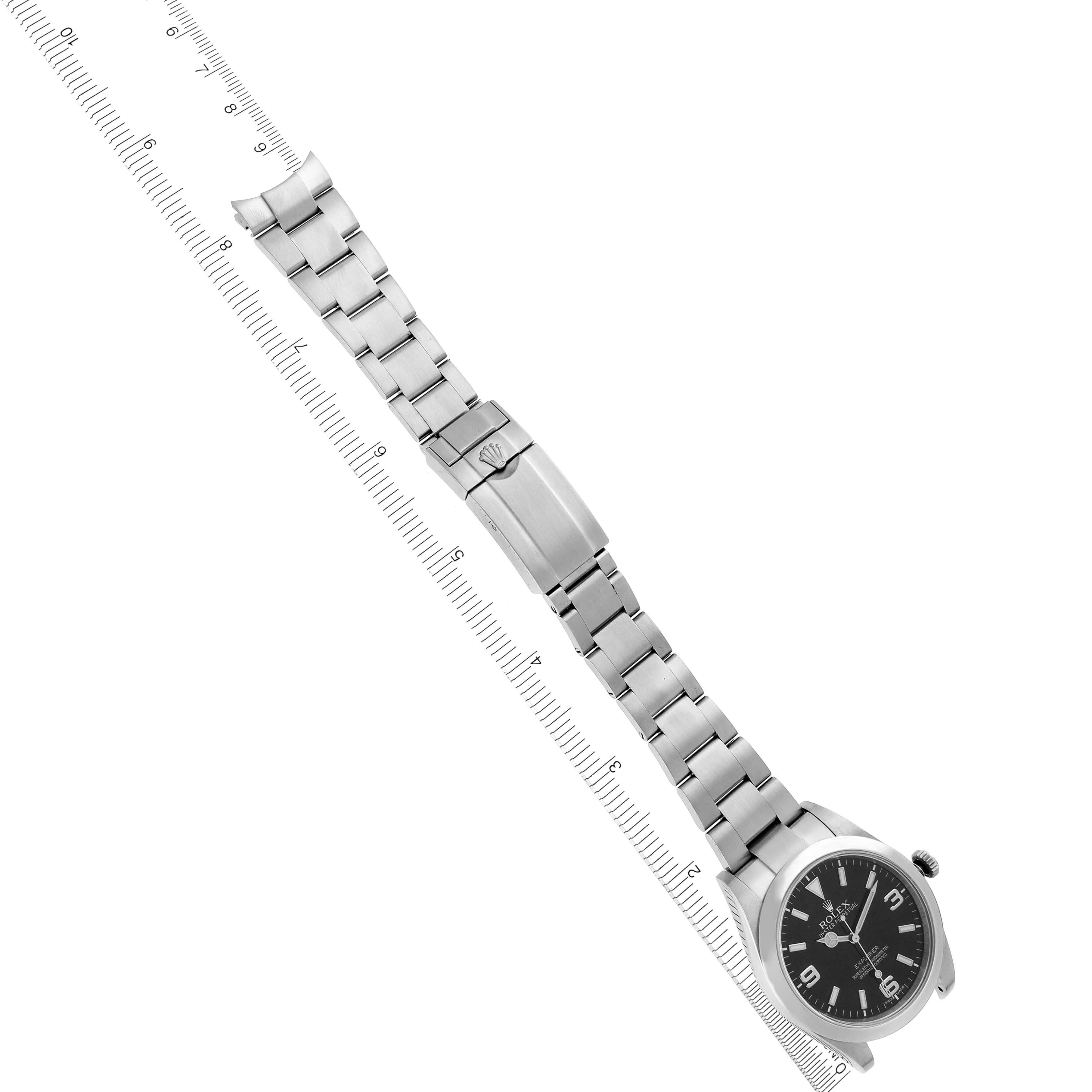 The Rolex Explorer 214270 Men's Stainless Steel Black Dial 214270 Men's Stainless Steel Black Dial watch is shown from a top view, highlighting the face, bezel, and full bracelet with a clasp.