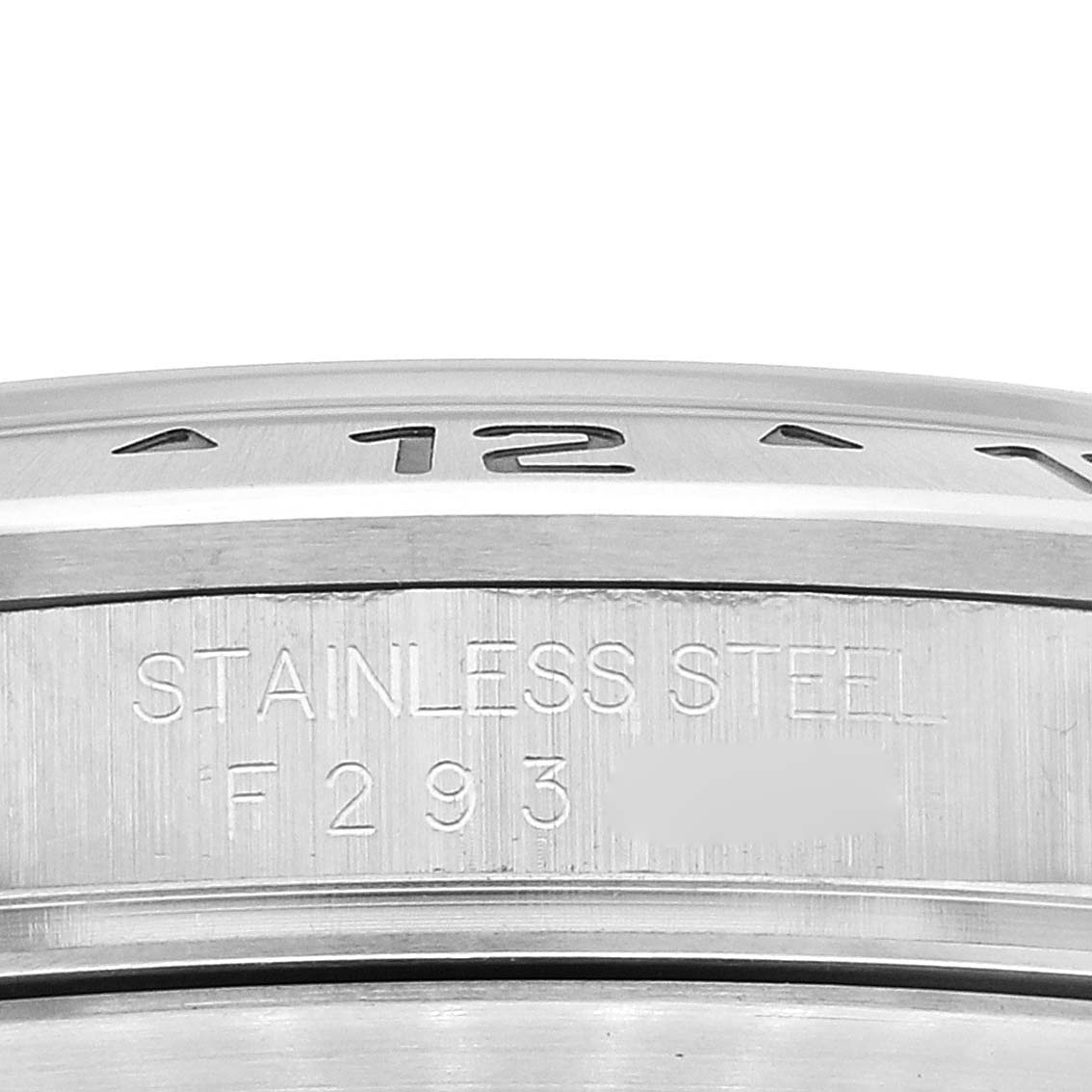 The image shows a close-up of the bezel and side of a Rolex Explorer 16570 Men's Stainless Steel White Dial 16570 Men's Stainless Steel White Dial watch, highlighting its stainless steel material.